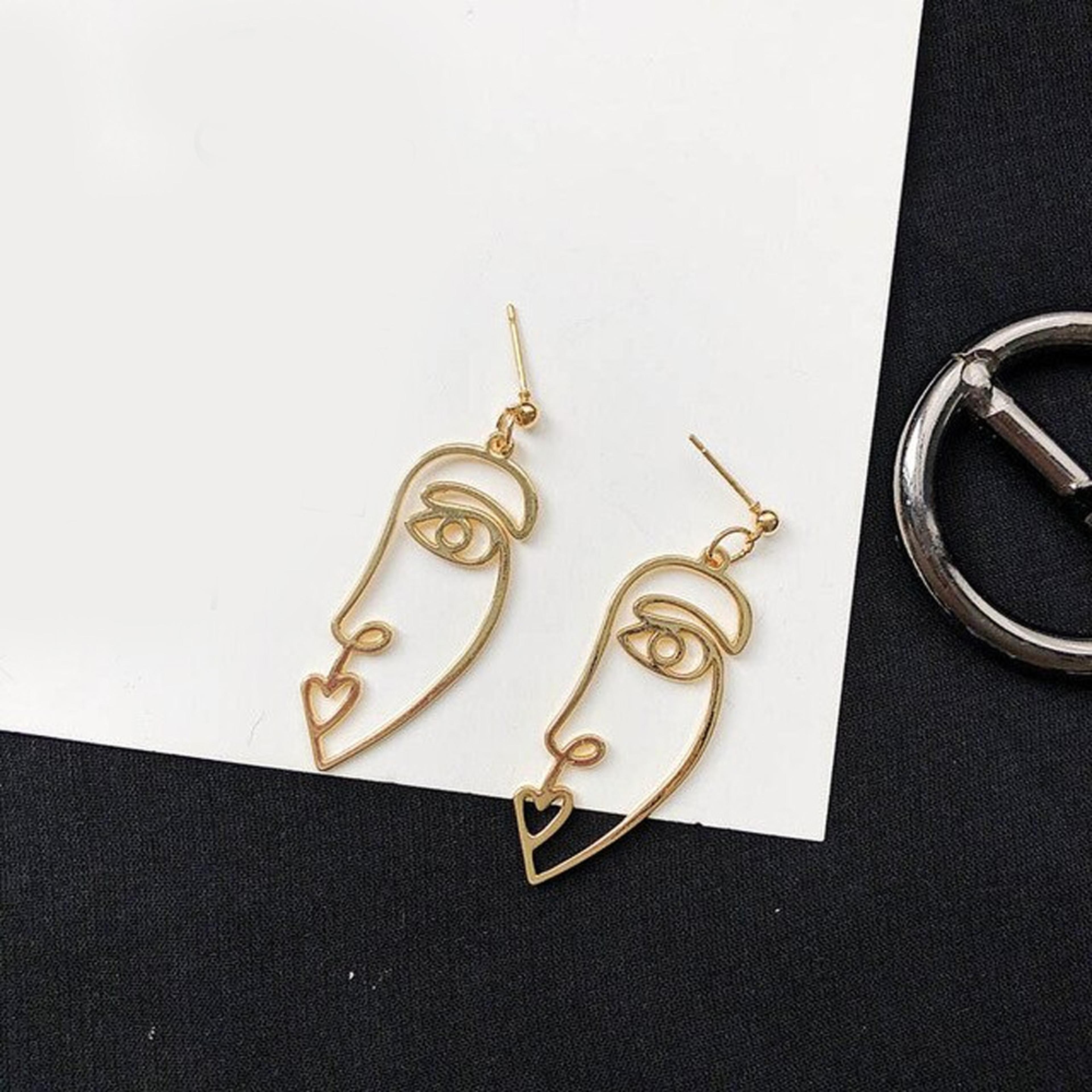 Zinc Alloy Wire Face Earrings 4