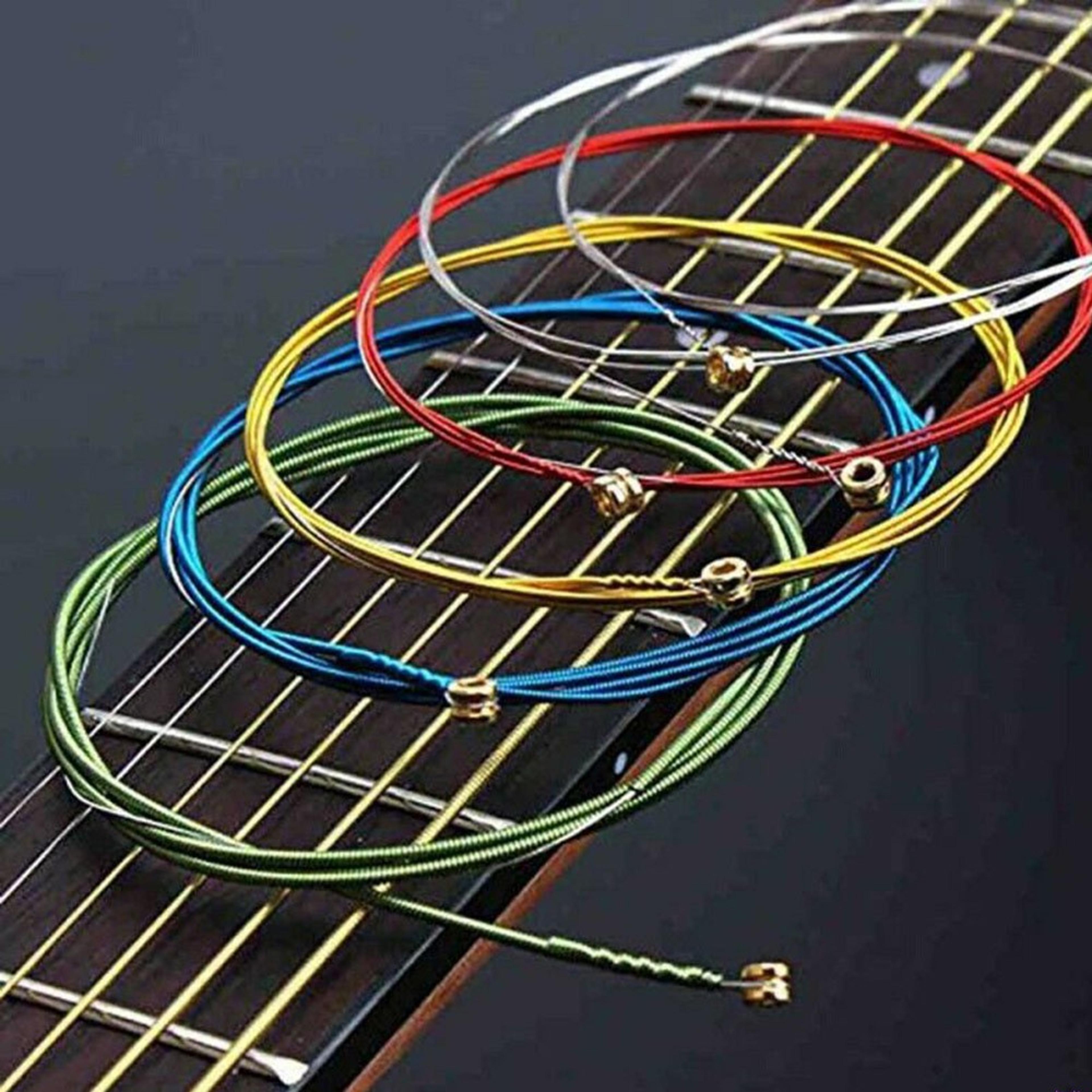 multicolored acoustic guitar strings