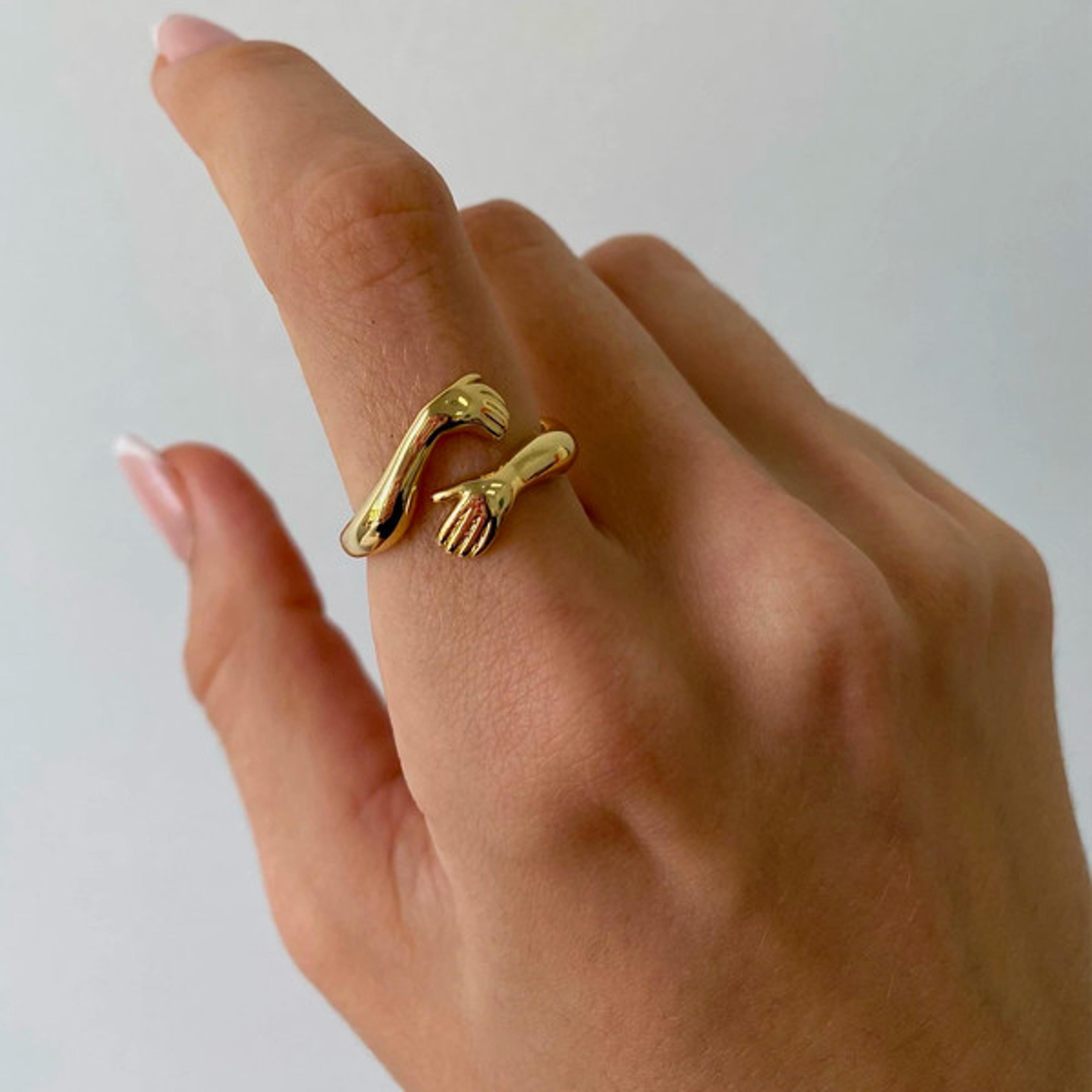 hugging hands ring