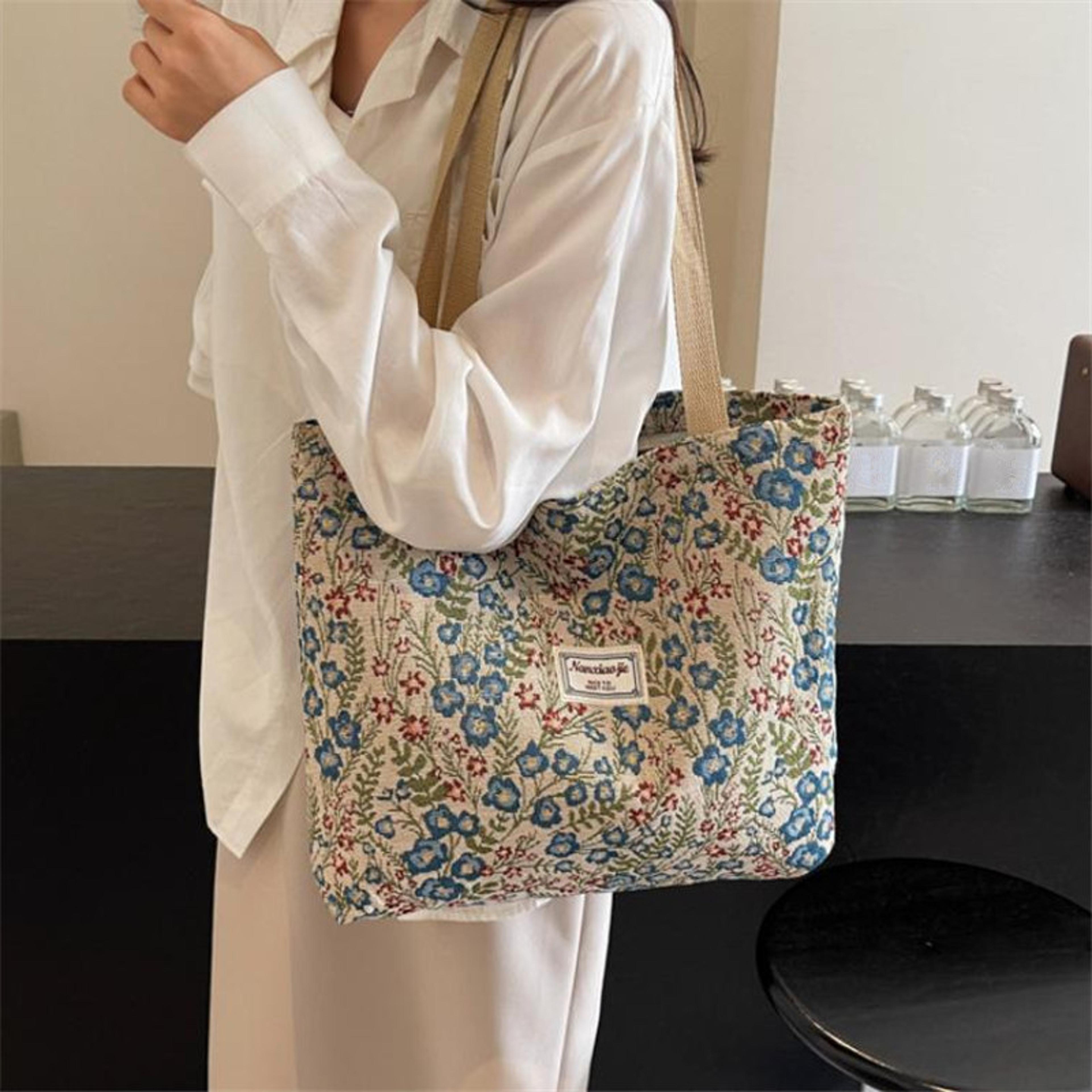 floral canvas tote bag and embroidered shoulder bag