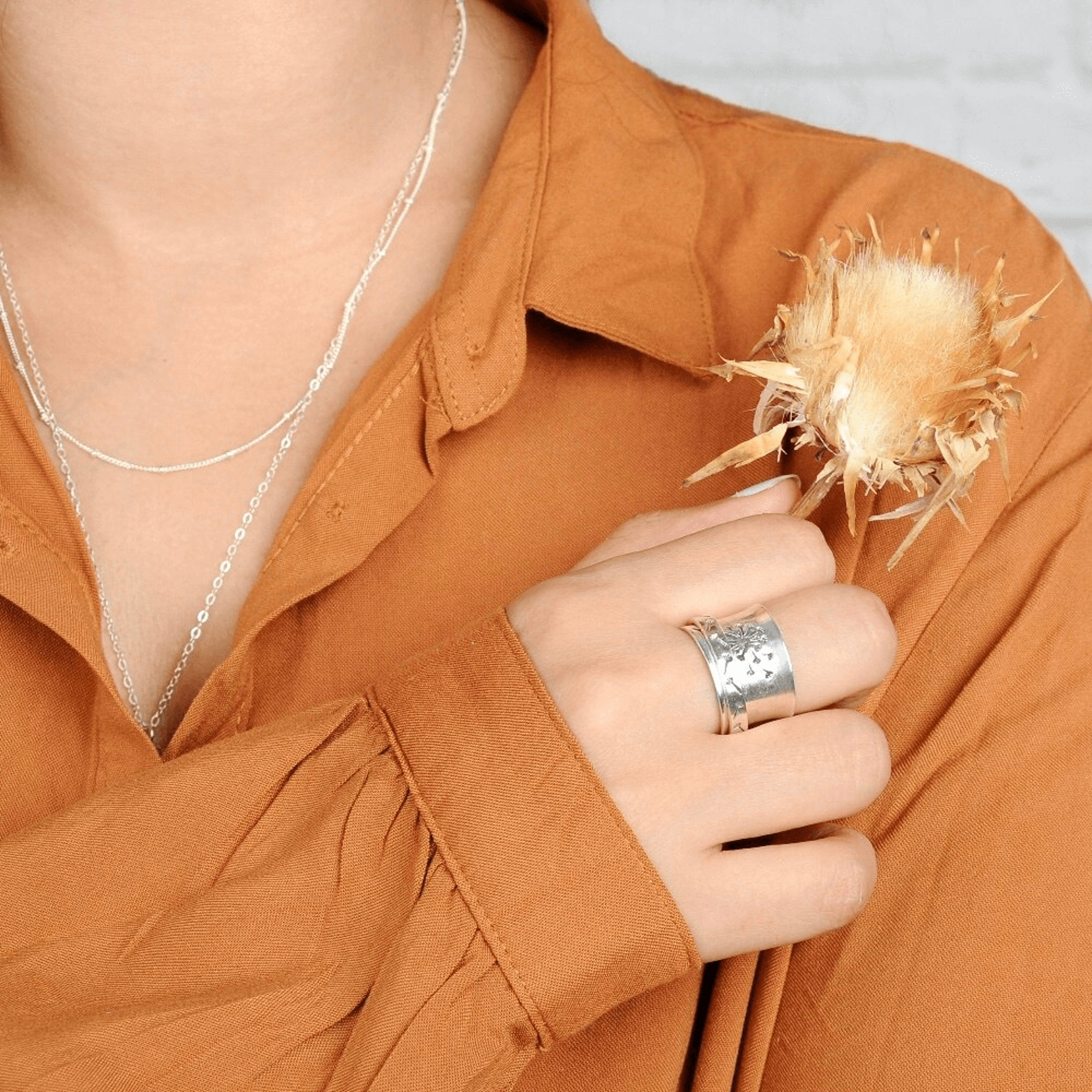 handmadevintagespinnerbohosilverstatementring3.png