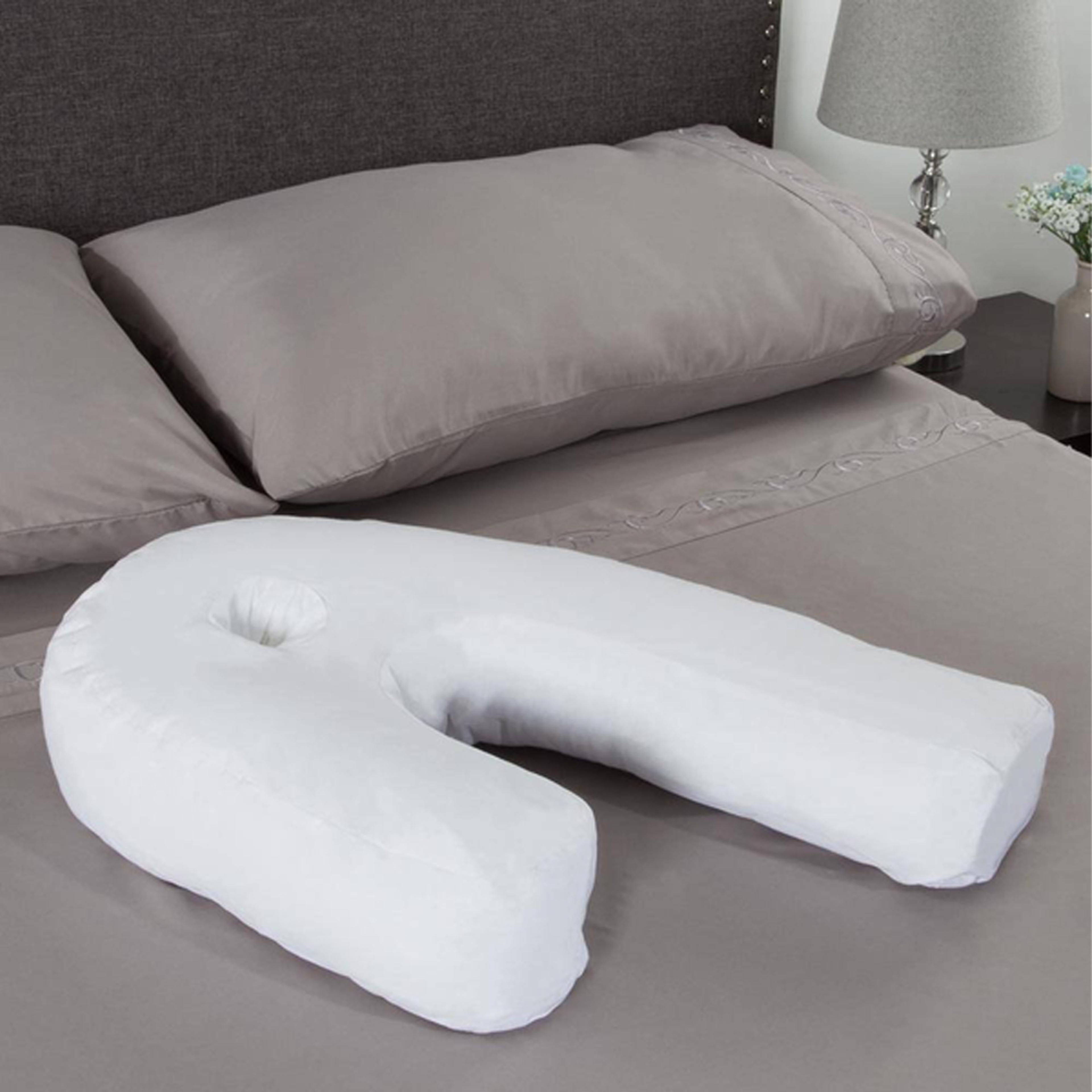 Person comfortably resting their head on the pillow