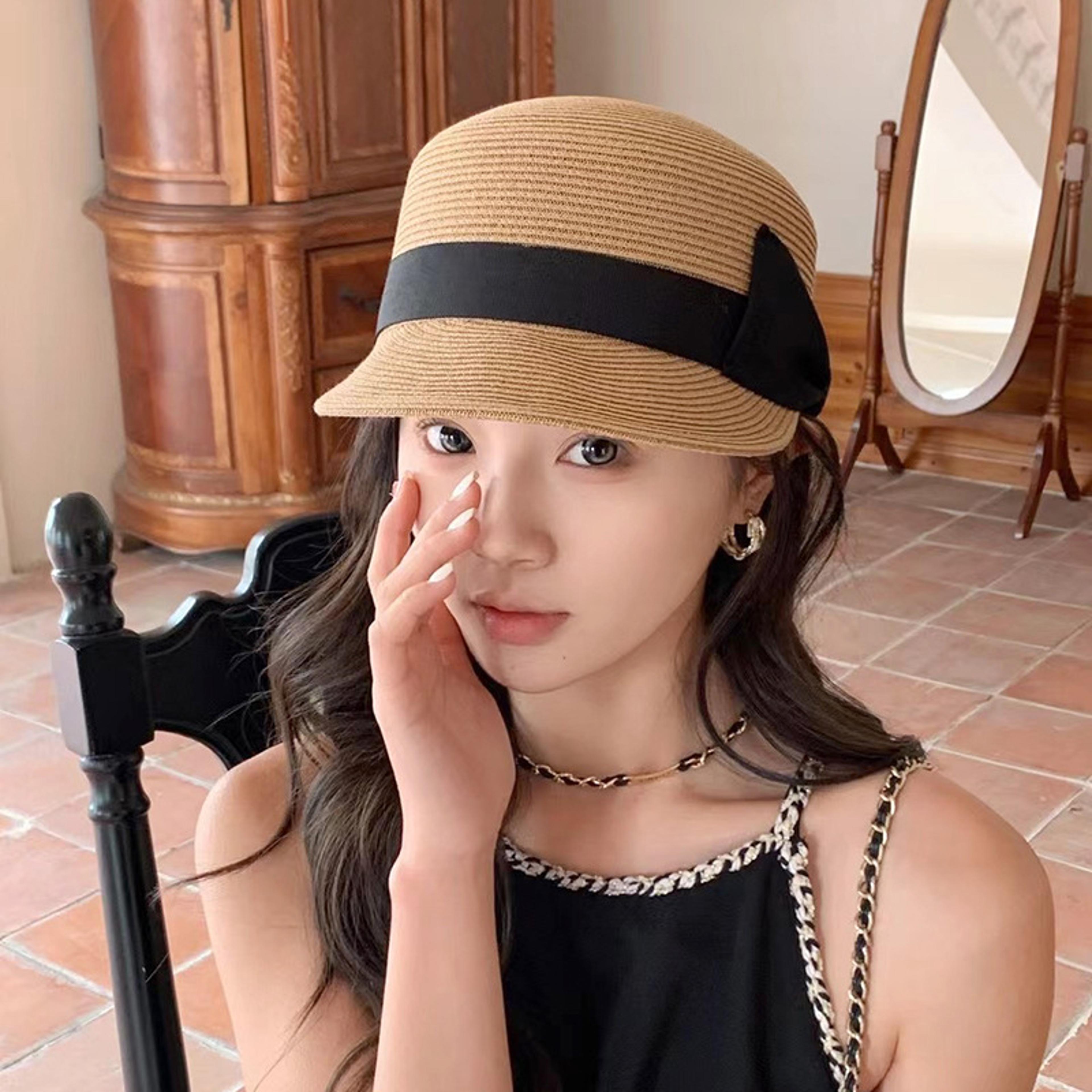 elegant women straw sun hat with bowknot for beach vacation and summer outdoor style