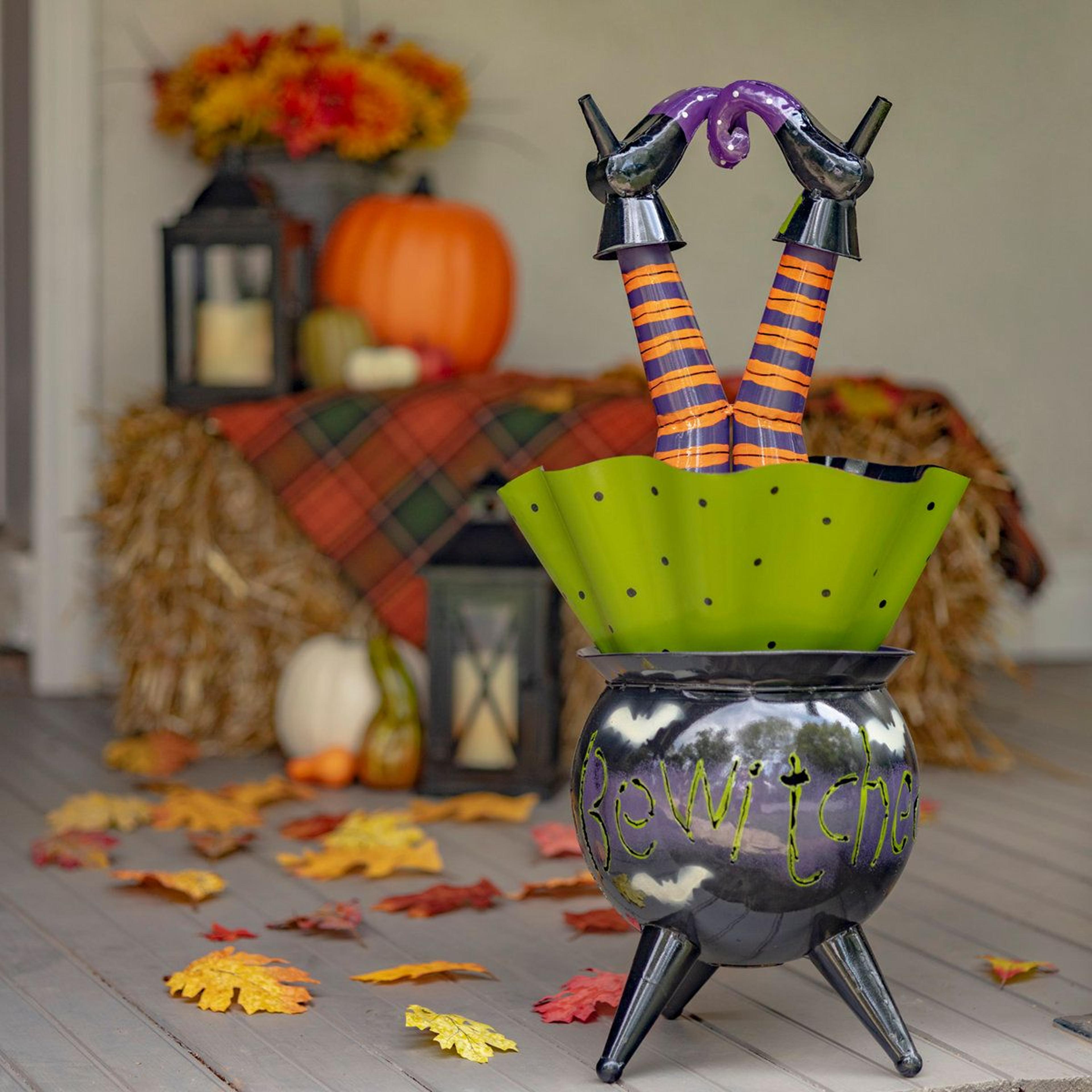 tall metal halloween cauldron figurine with witch legs