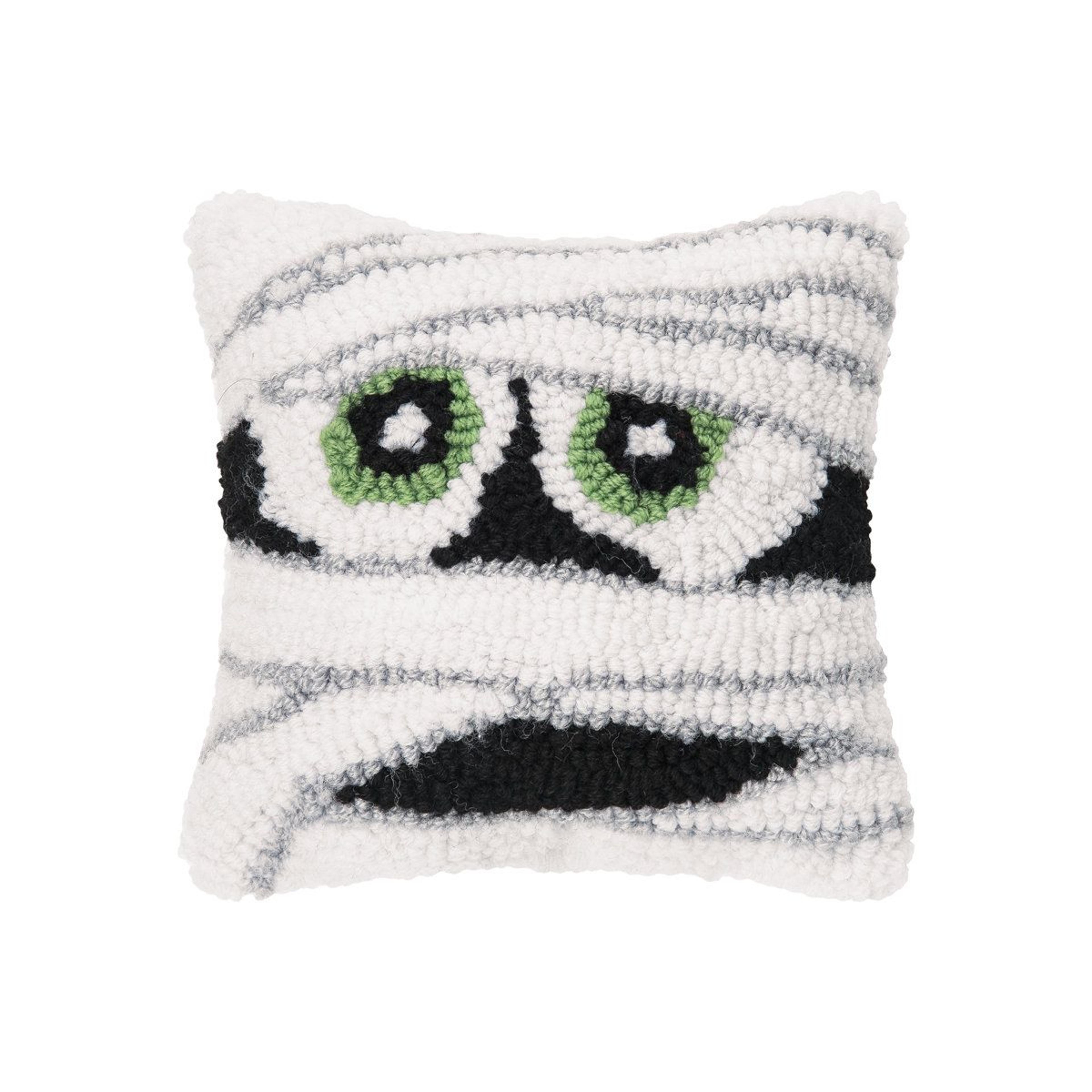 mummy face halloween throw pillow with textured acrylic cover