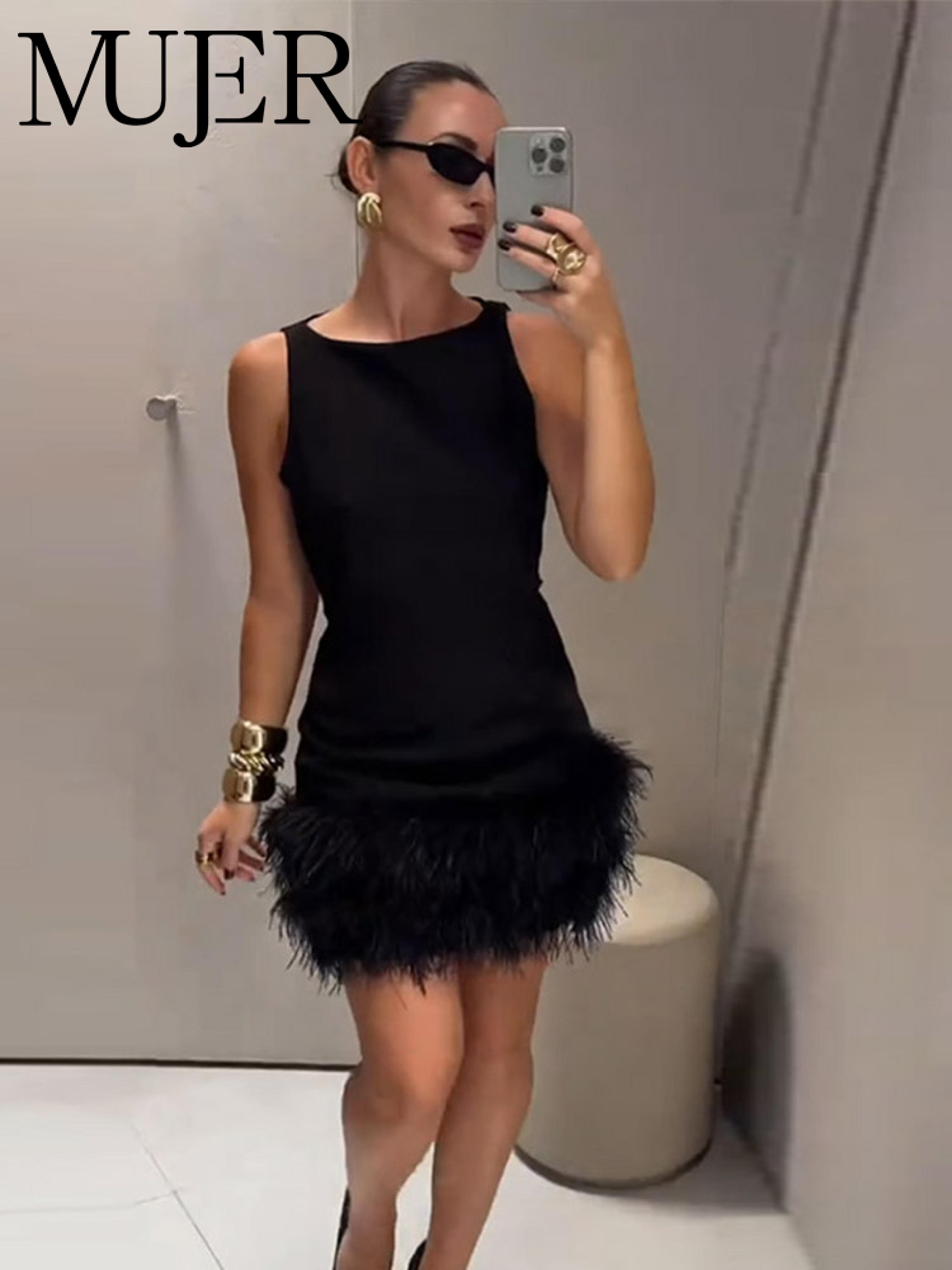 women's black feather mini dress with off-the-shoulder halter neckline