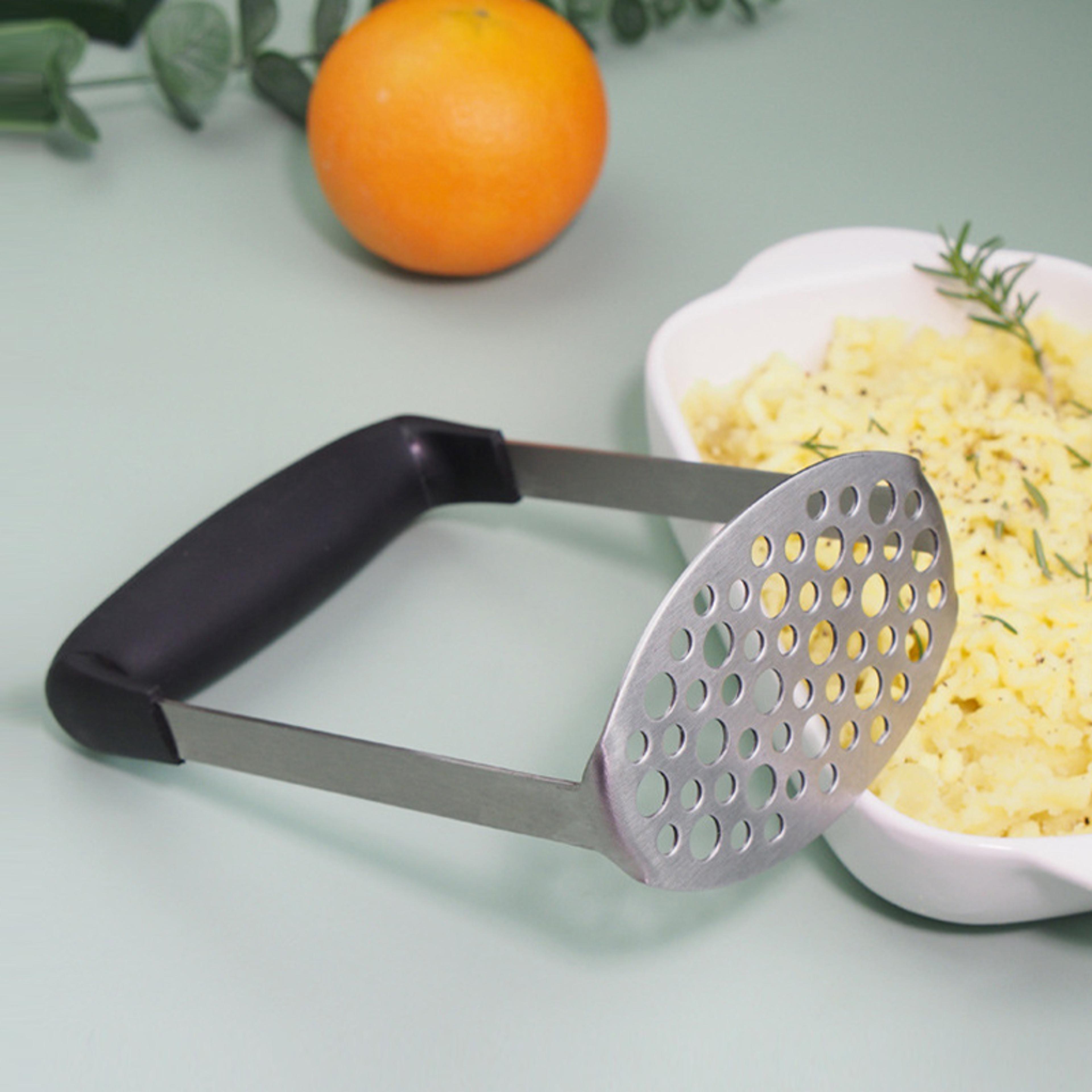 stainless steel potato masher press, ricer, and fruit juice maker for smooth mashed potatoes
