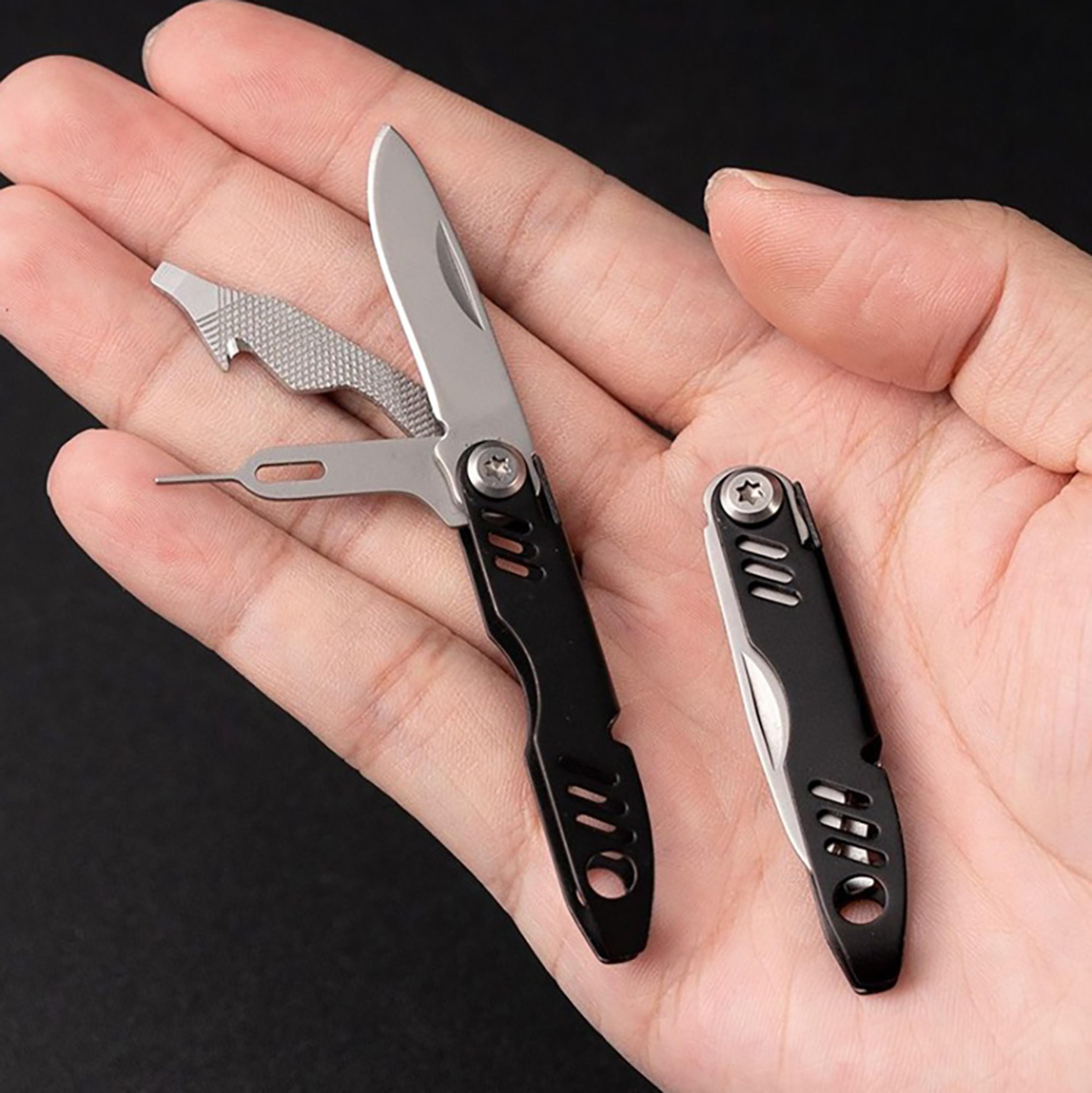 portable multi-tool keychain mobile phone card pickup needle, bottle opener, folding knife