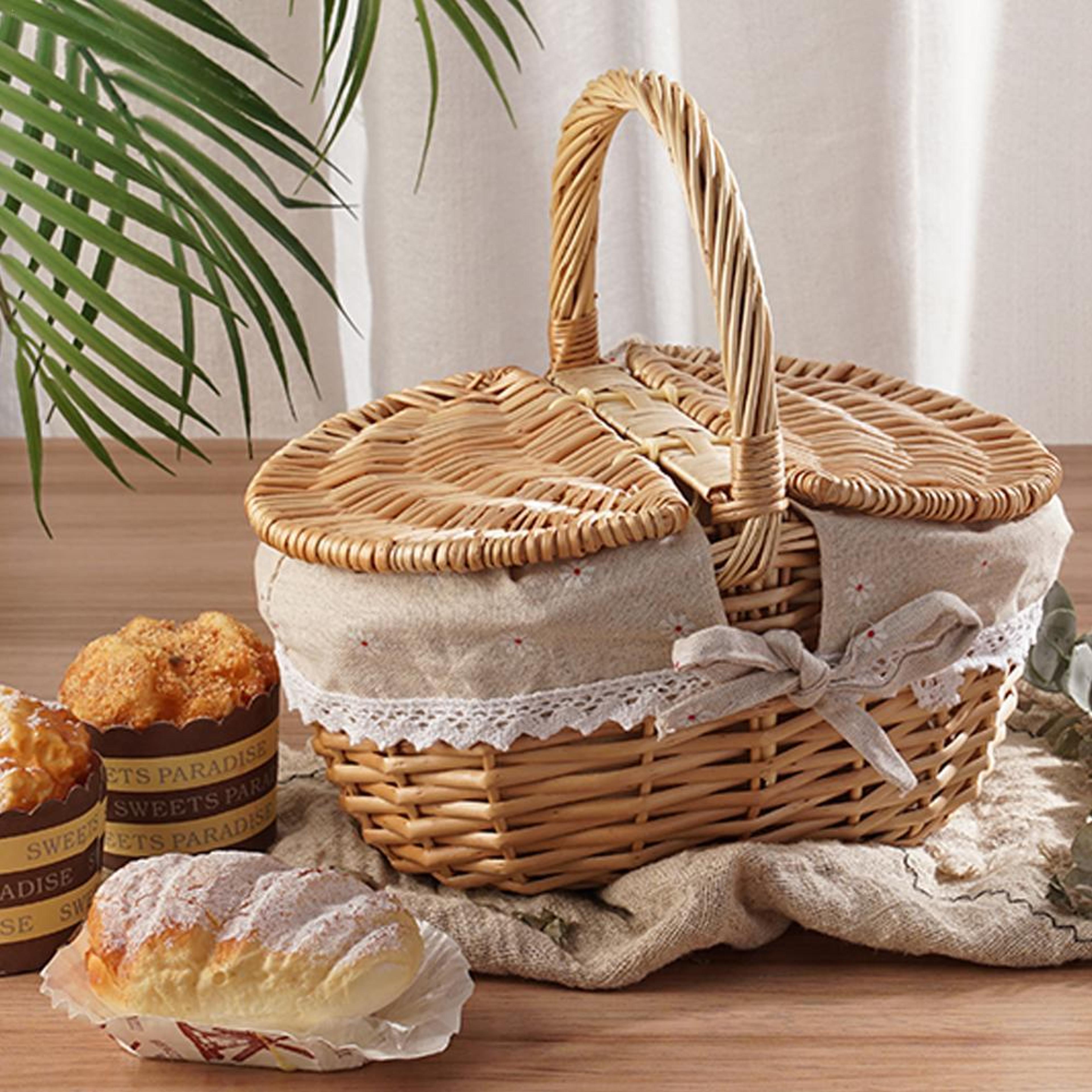 large wicker picnic basket with lid for outdoor gatherings and rustic storage