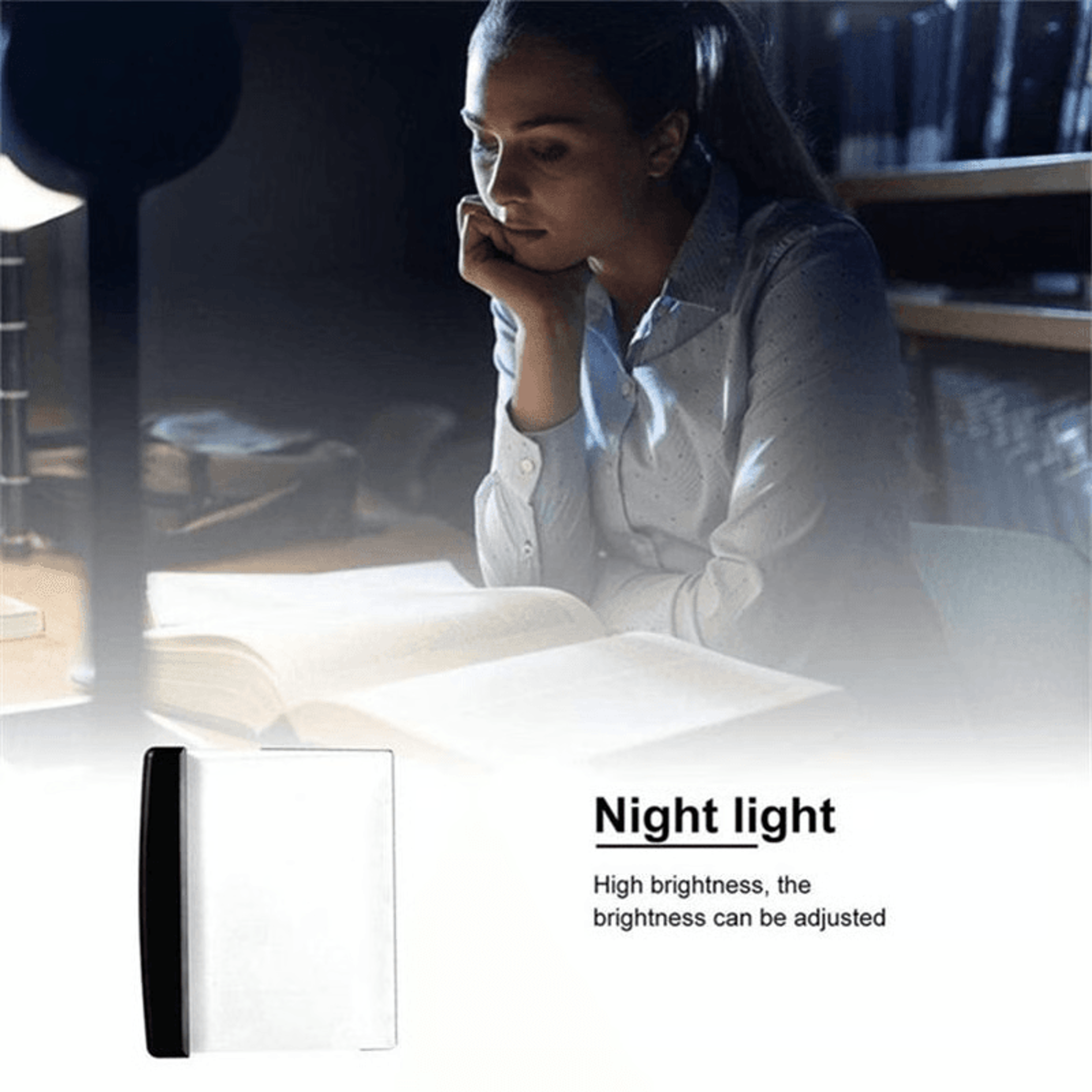 portable flat reading light used on a book while traveling