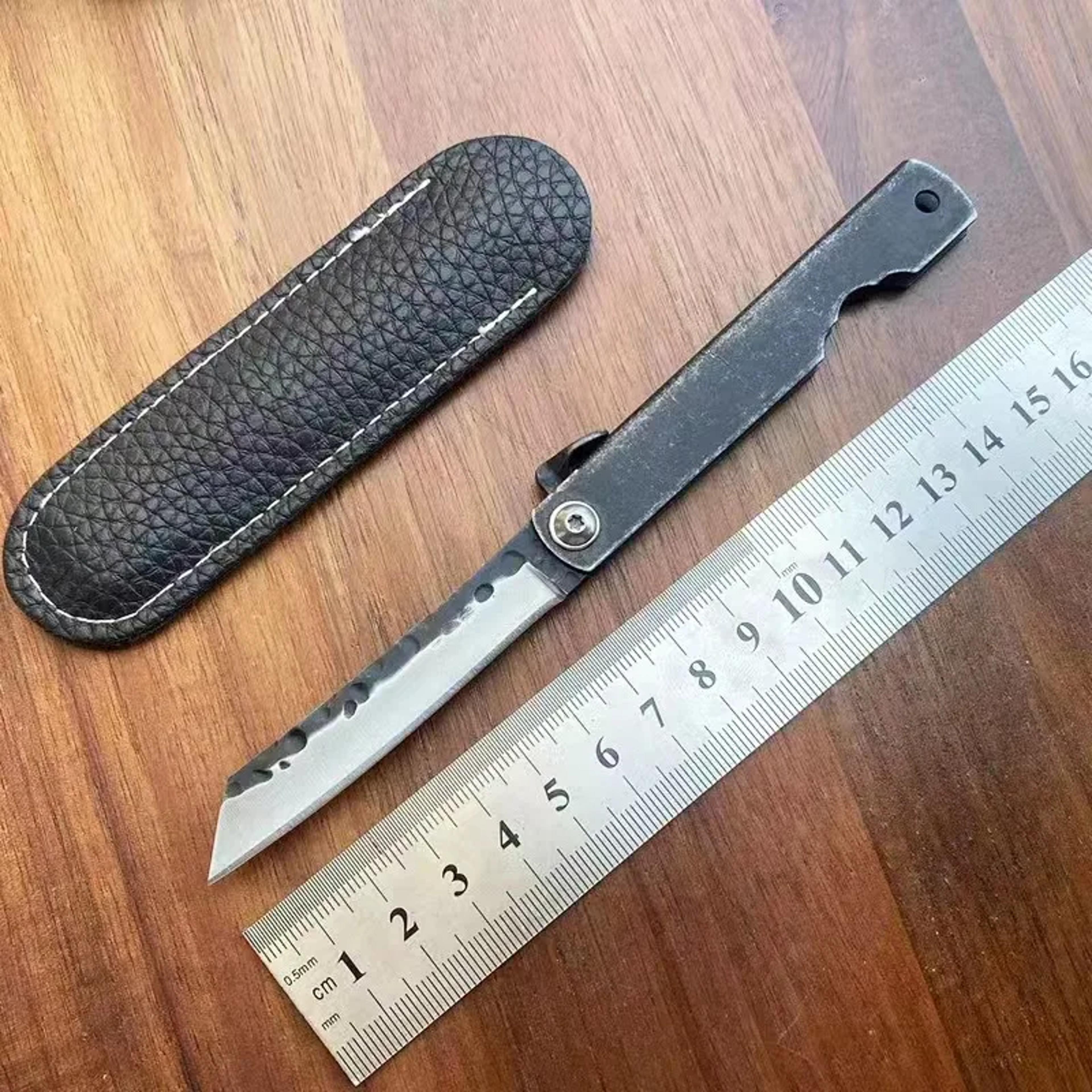 portable folding stainless steel pocket knife for camping and outdoor travel