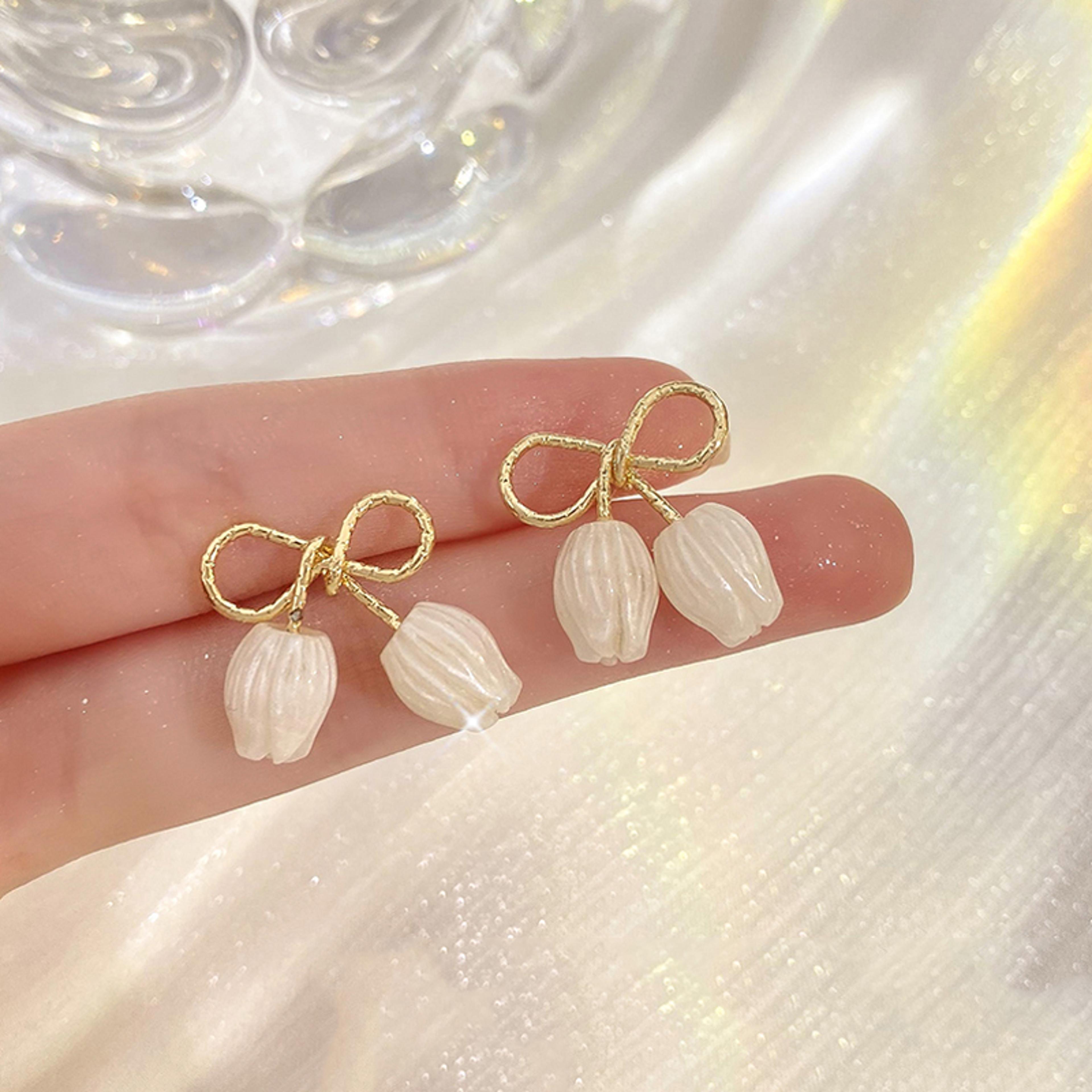 Elegant Tulip Bloom Stud Earrings White Flower Bridal Earrings With Gold Bow Accent 1