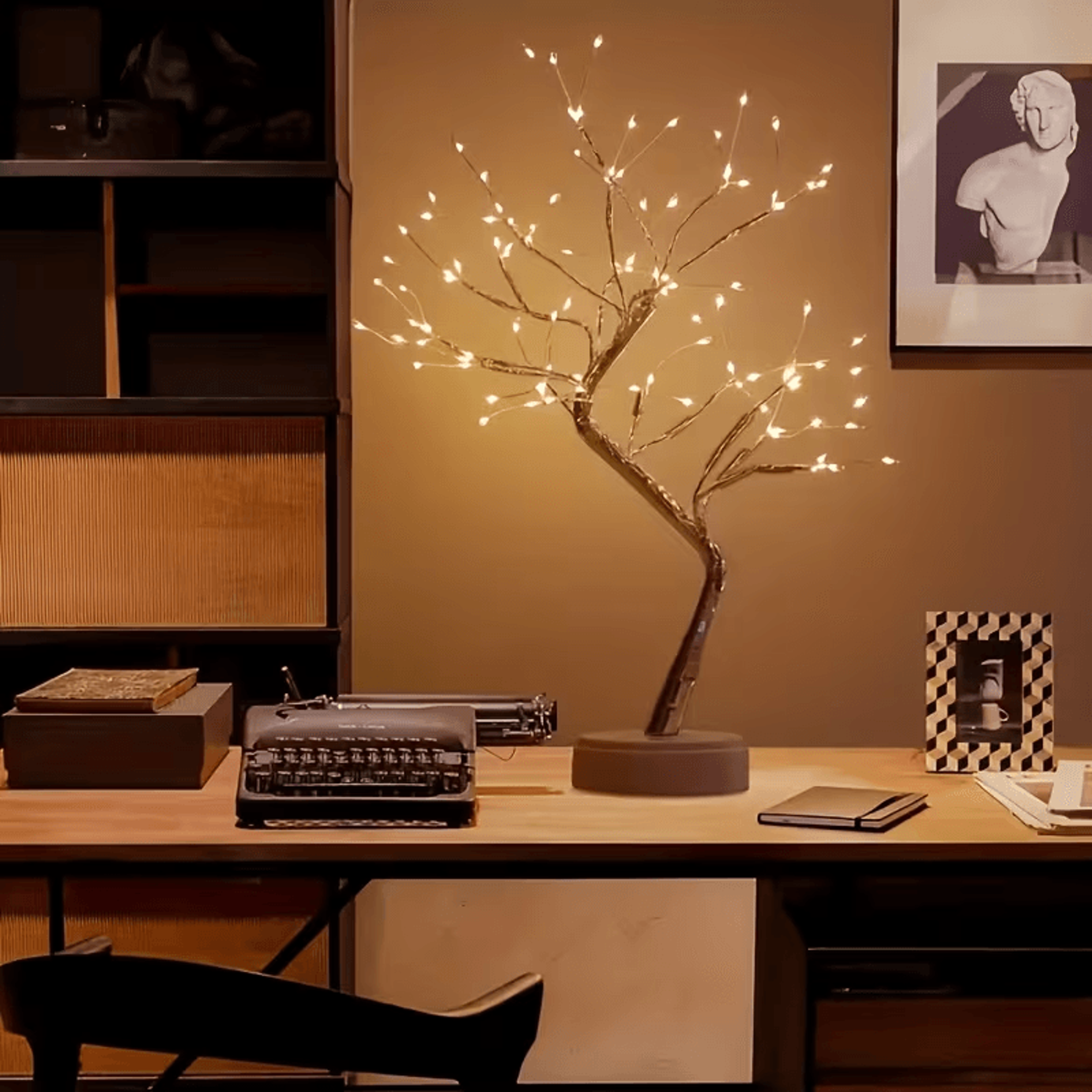 fairy light spirit tree lamp on bedside table at night