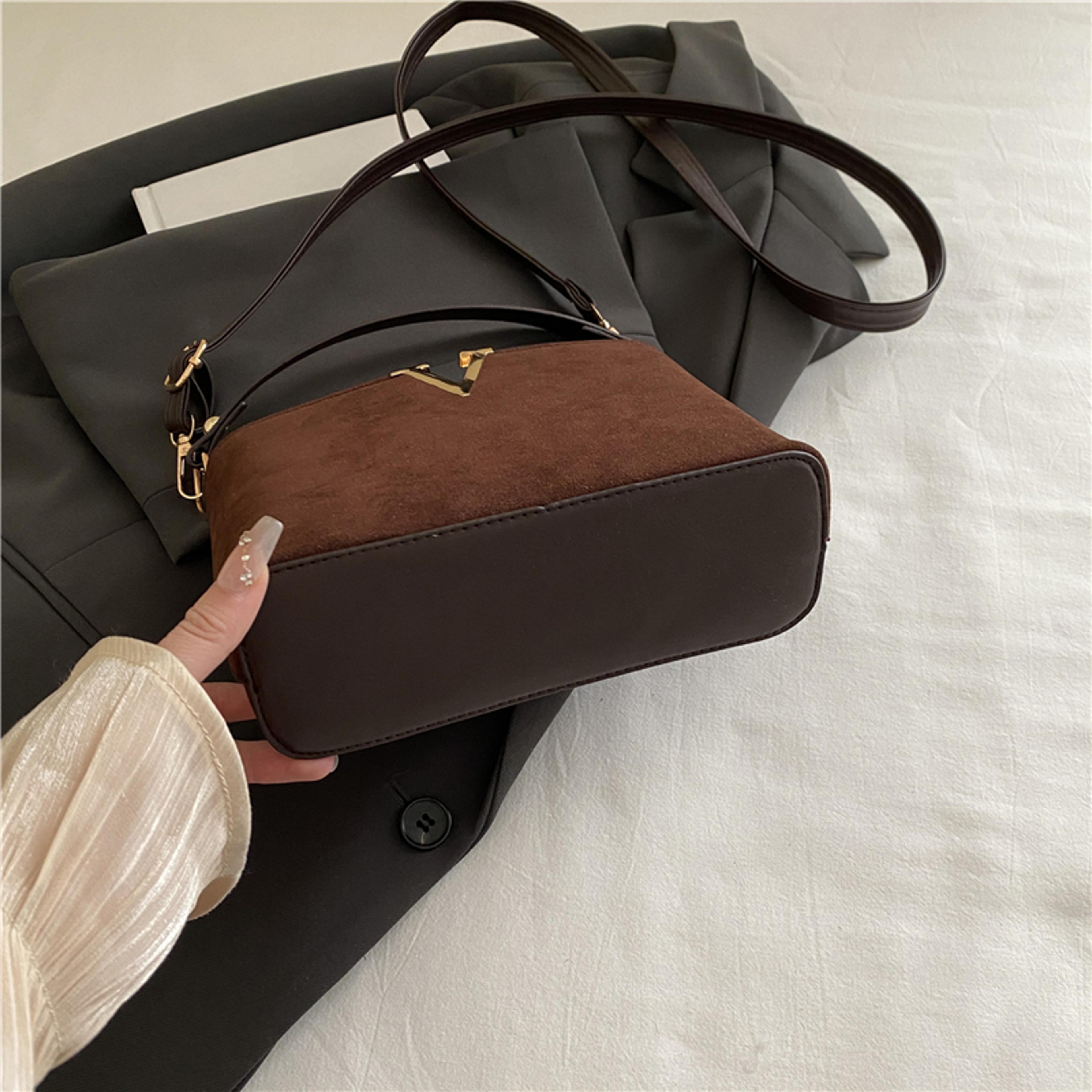 luxury suede handbag with v emblem elegant top handle bag