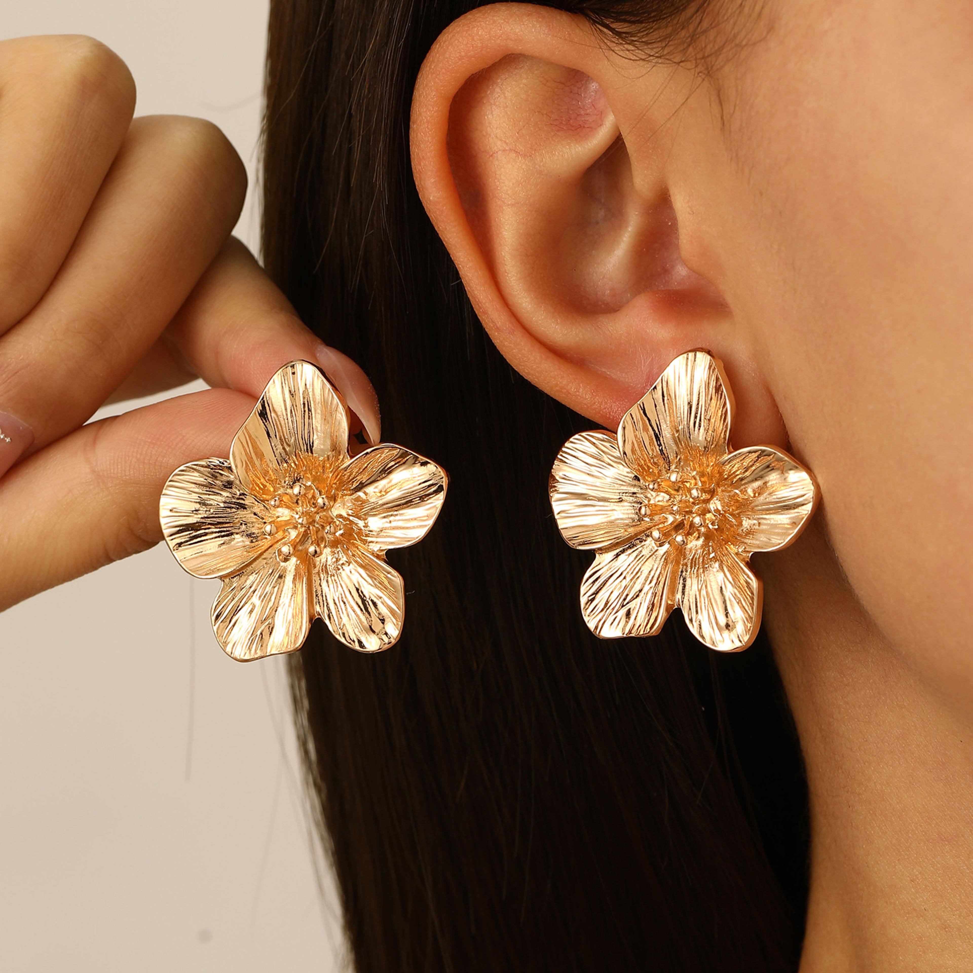 gold color stainless steel flower stud earrings for women, vintage metal earrings for girls, trendy daily wear jewelry