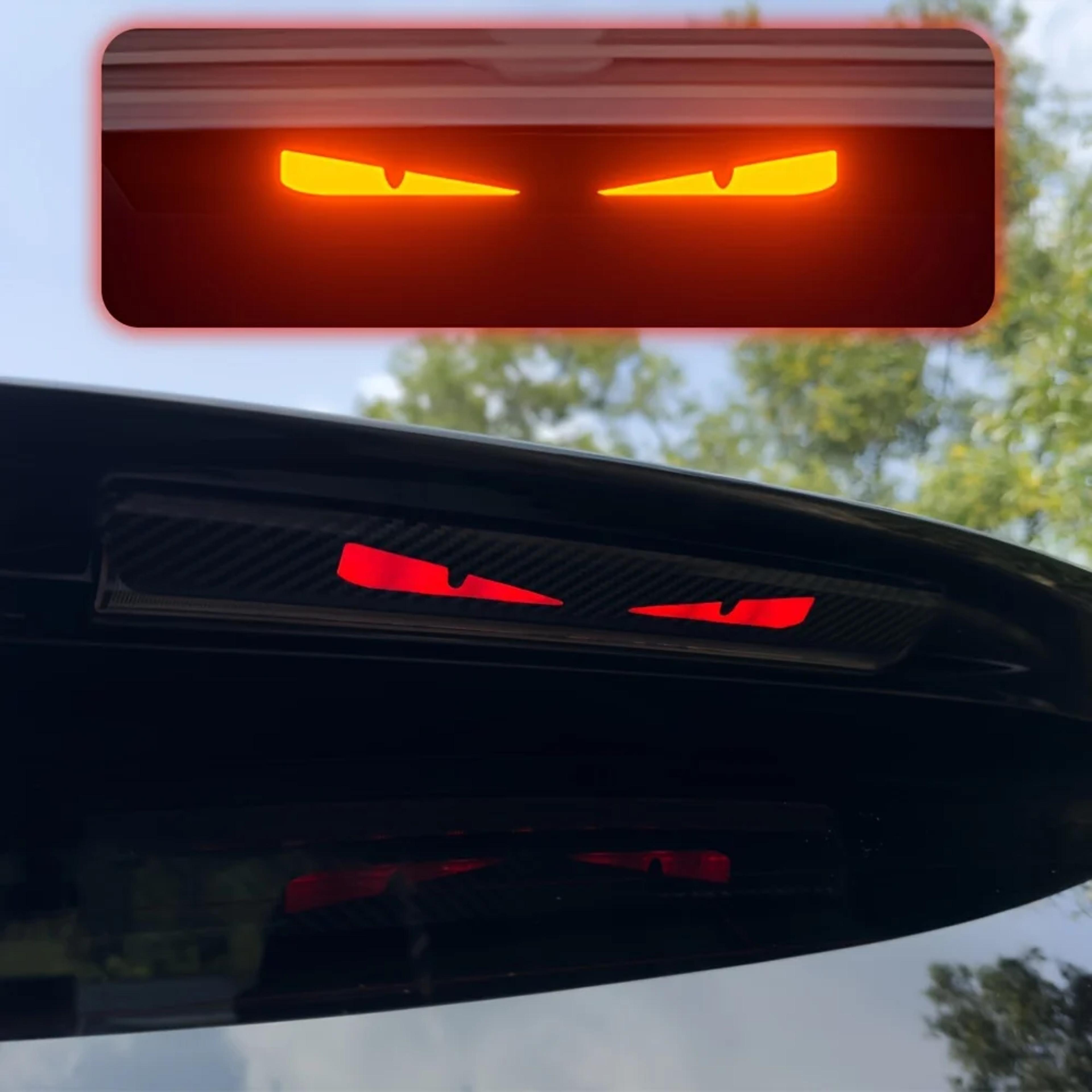 monster eyes car rear light sticker - cartoon devil eyes tail light decal, carbon fiber pattern, transparent night