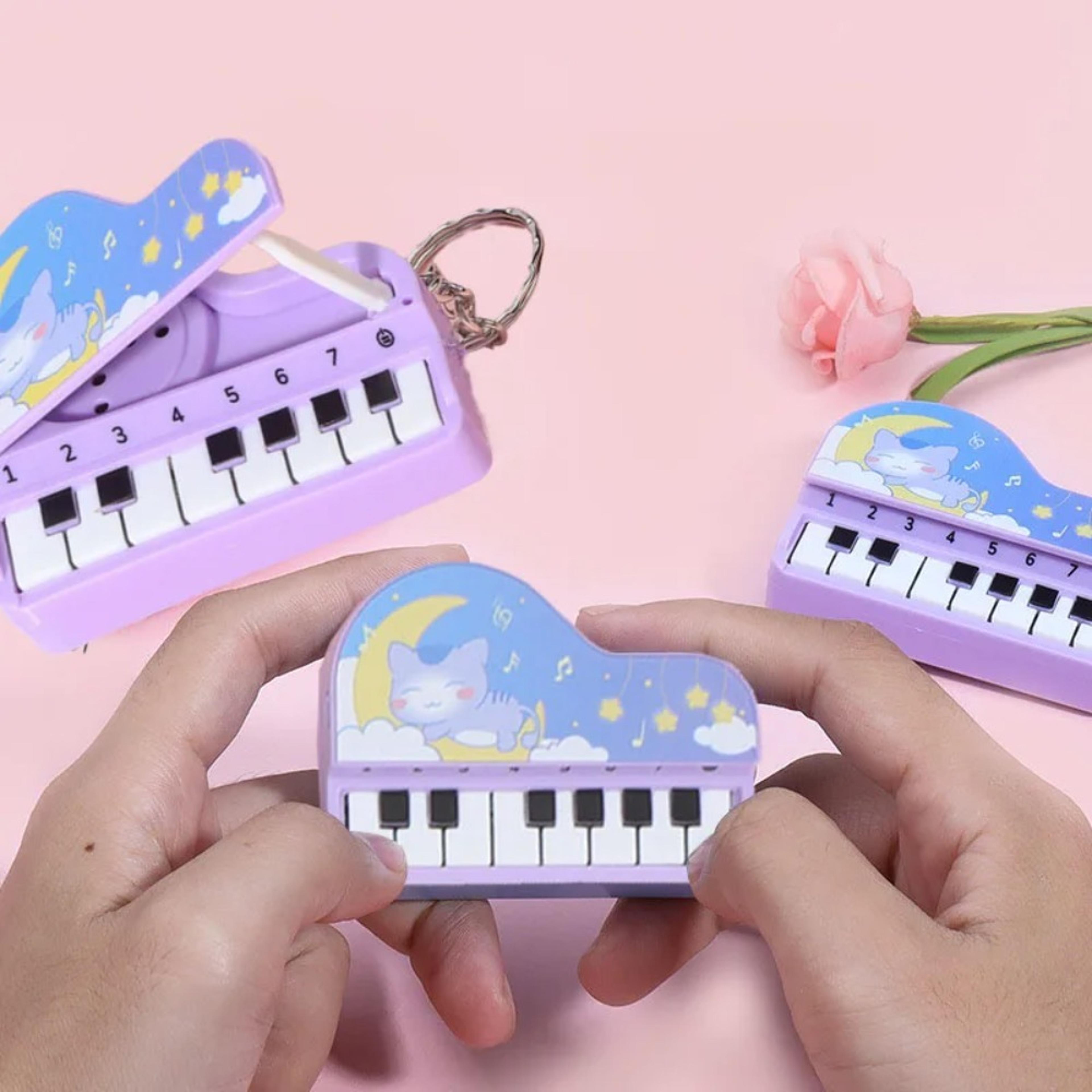 mini piano keychain toy with music game fun portable keyboard for kids learning
