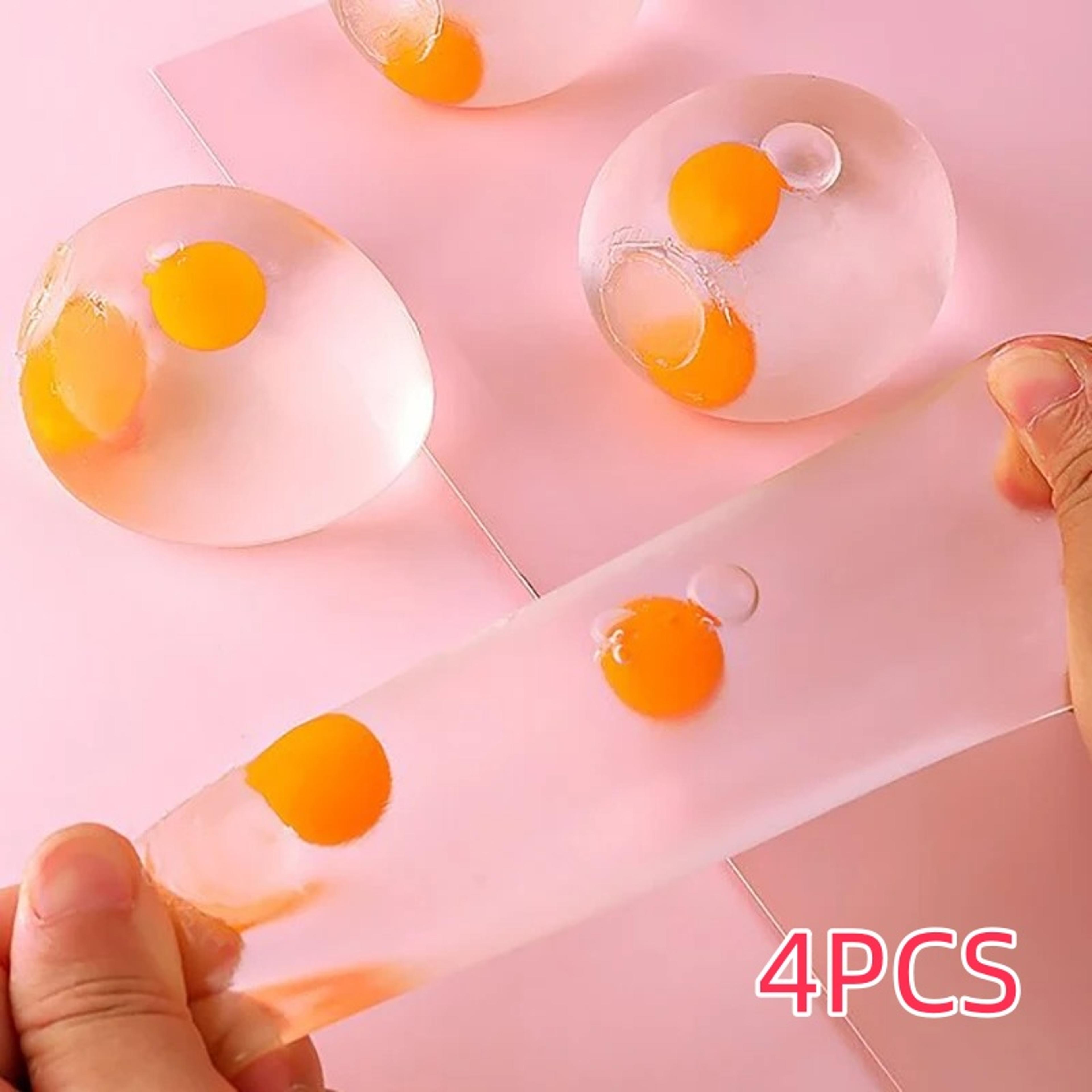 clear egg yolk squishy stress ball fun splat toy for kids and adults