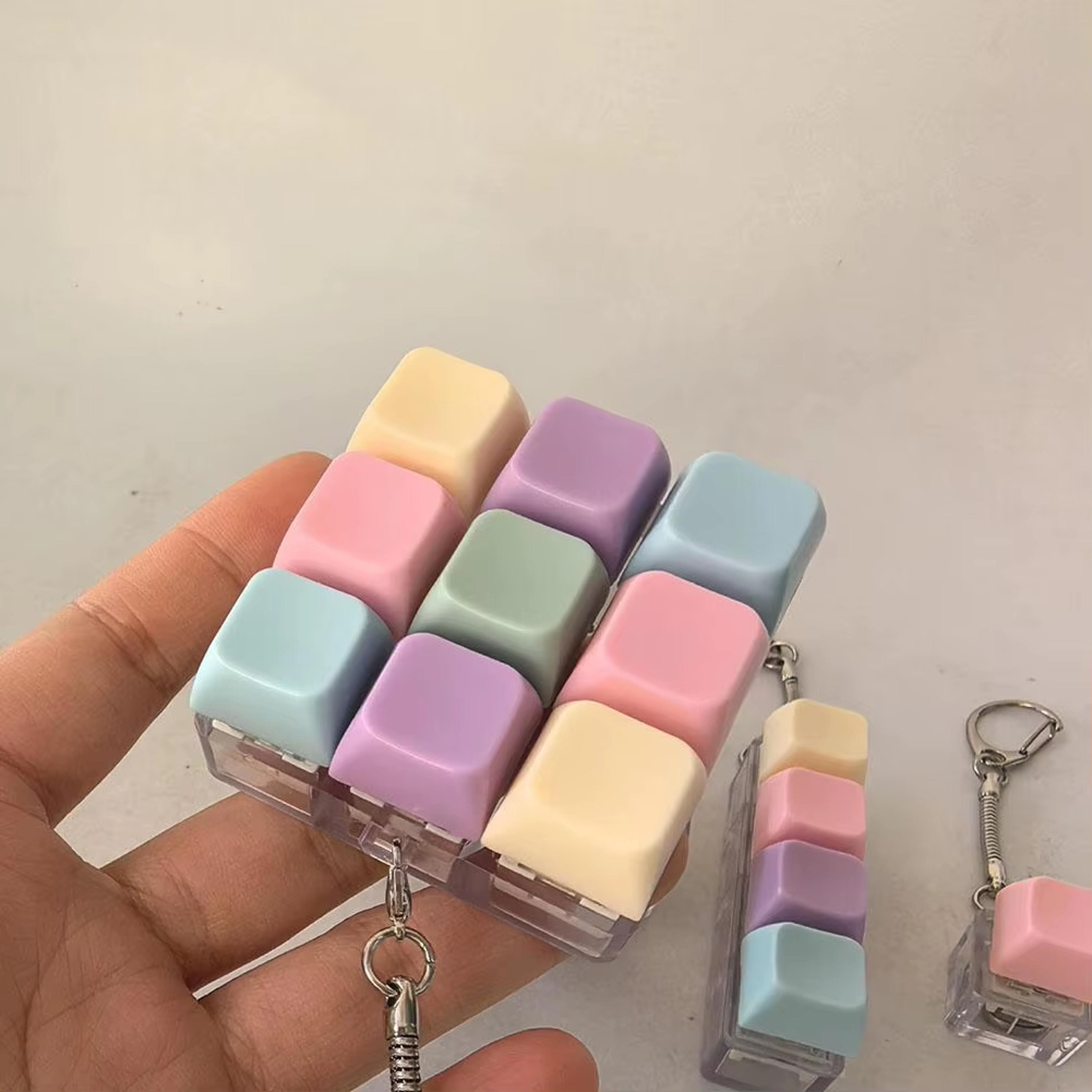 mini stress relief toy keyboard clicker keychain for focus, fidgeting & desk relaxation