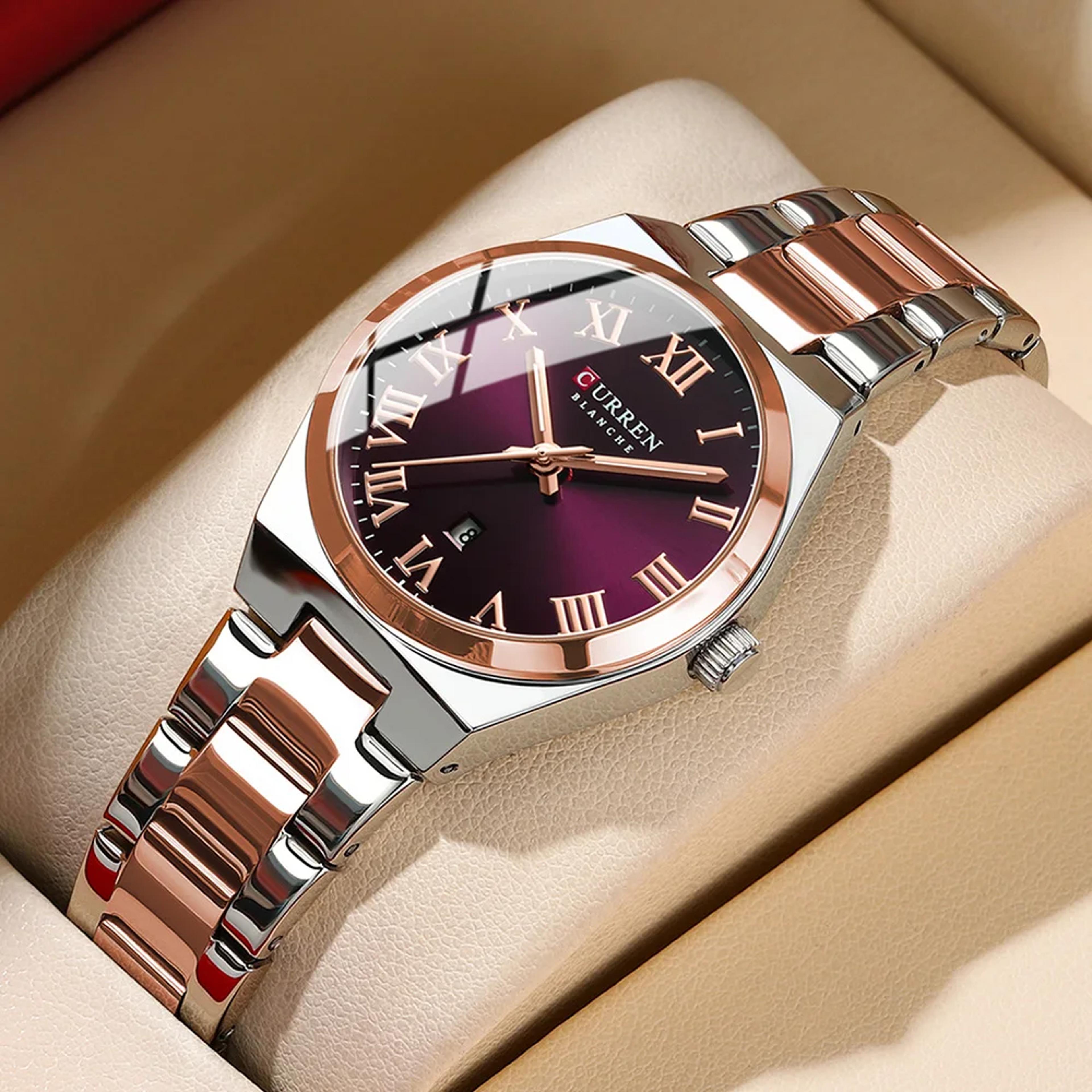 women's quartz watch with stainless steel bracelet and date display