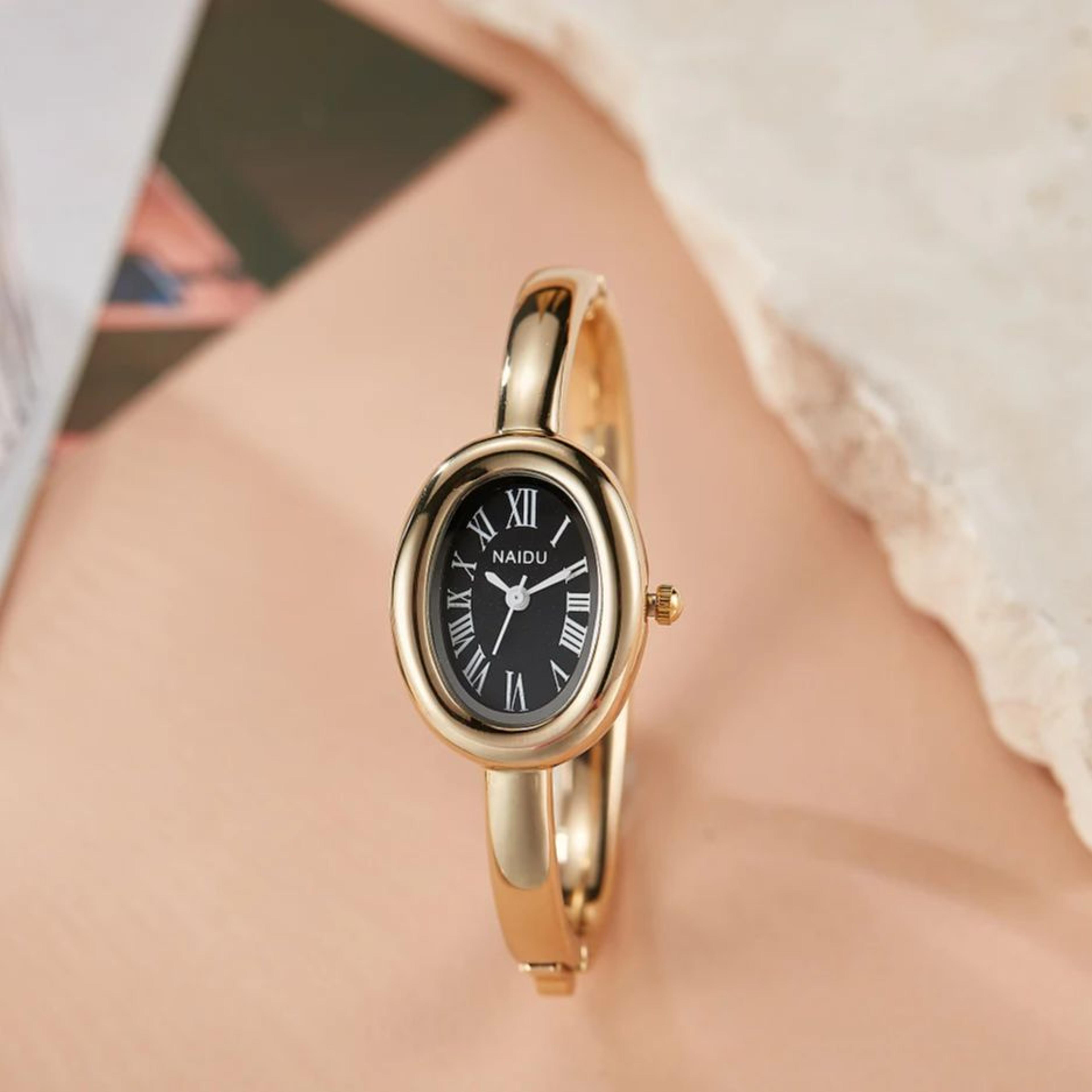 luxury oval women's quartz bracelet watch with roman numeral dial