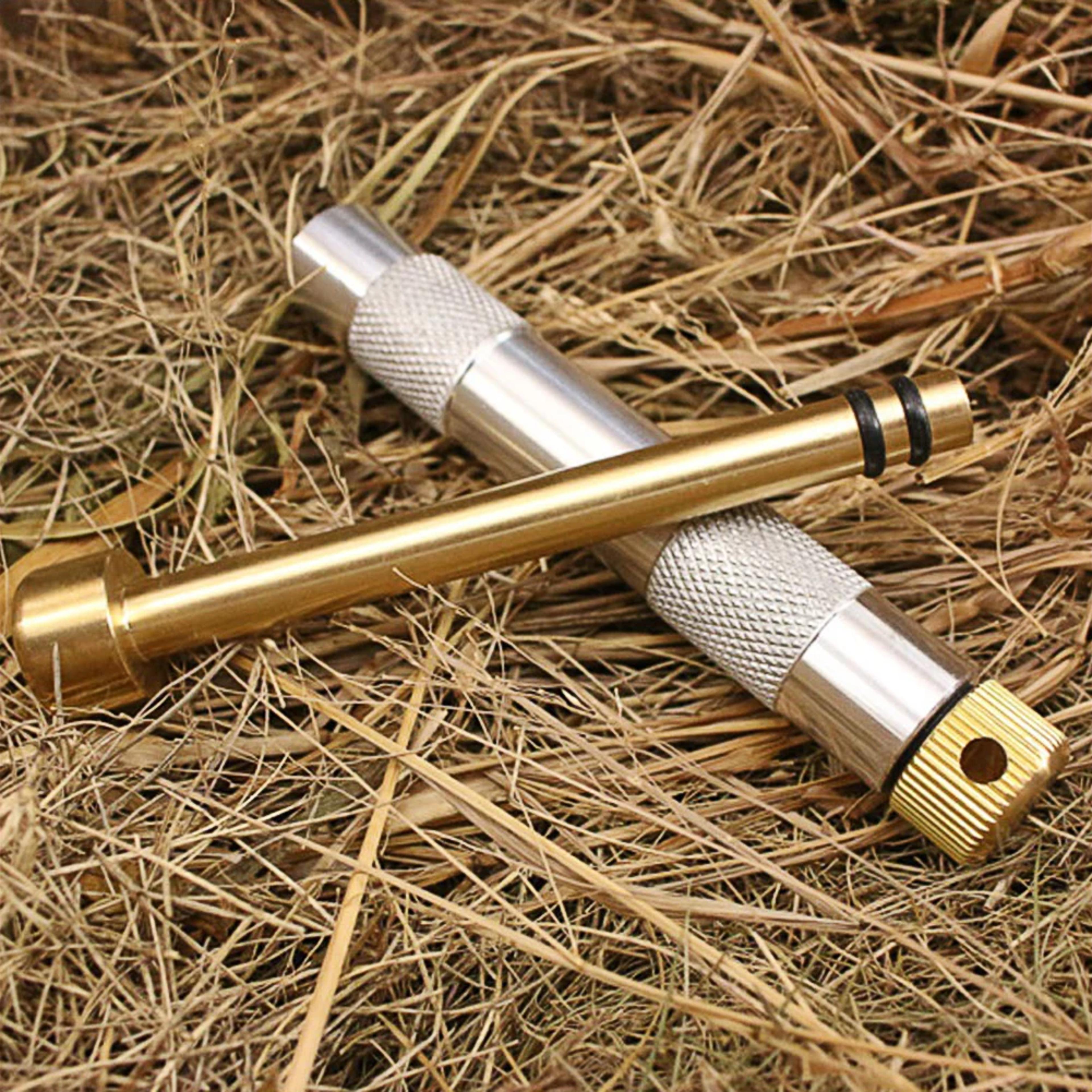 brass survival fire starter tube with outdoor igniter piston