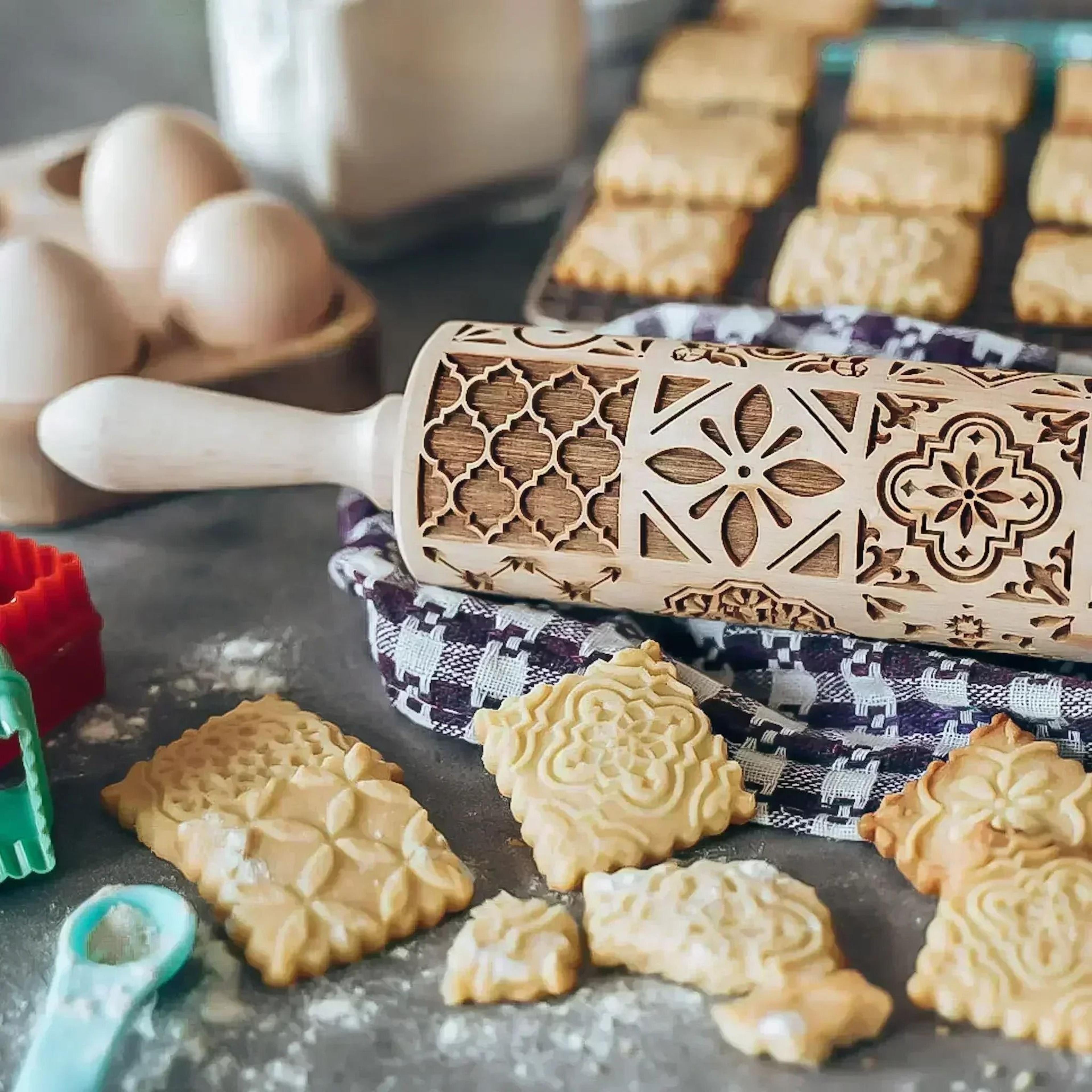 wooden embossed rolling pin with snowflake and elk pattern for holiday cookie and fondant baking