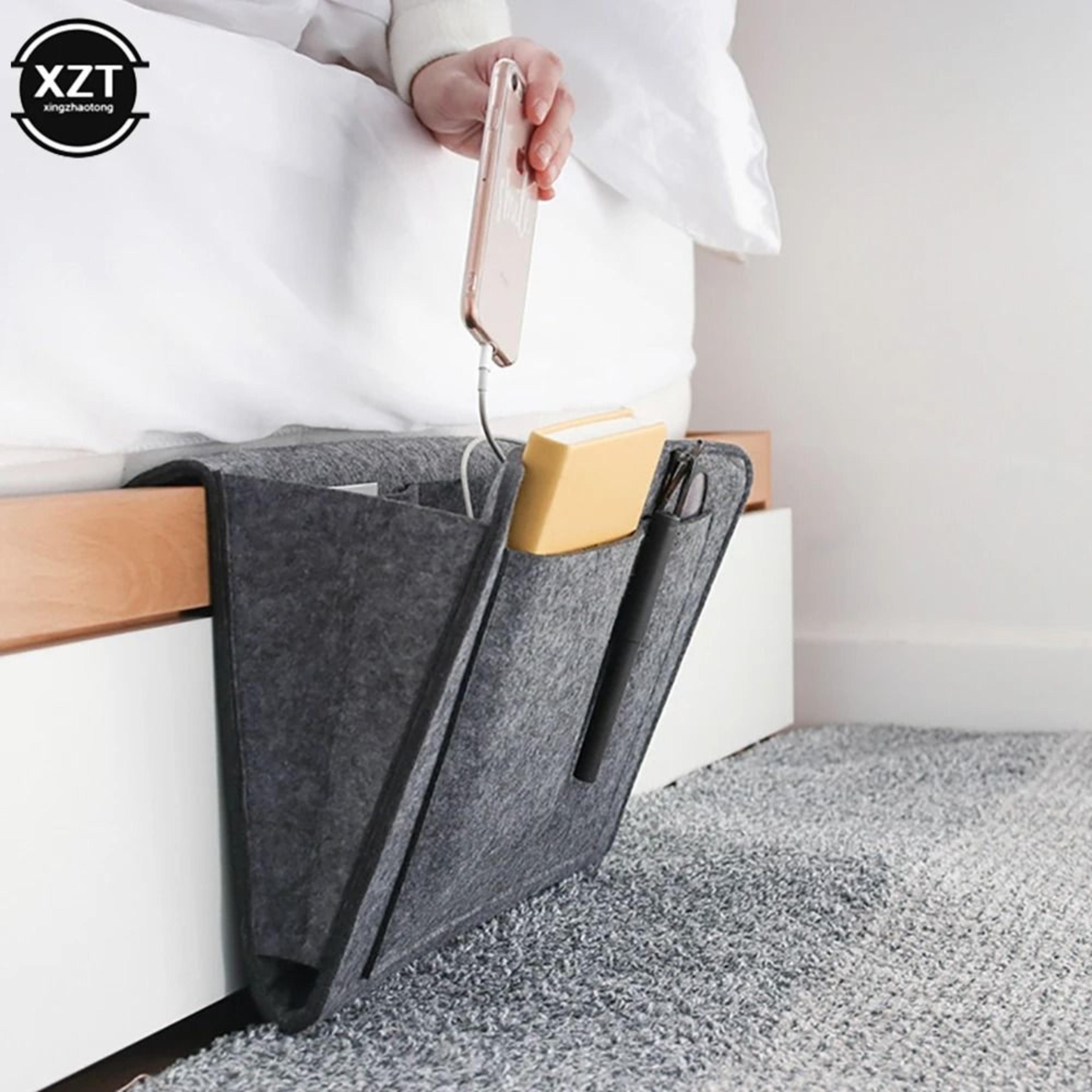 felt bedside storage organizer with pockets for phone, books, and accessories