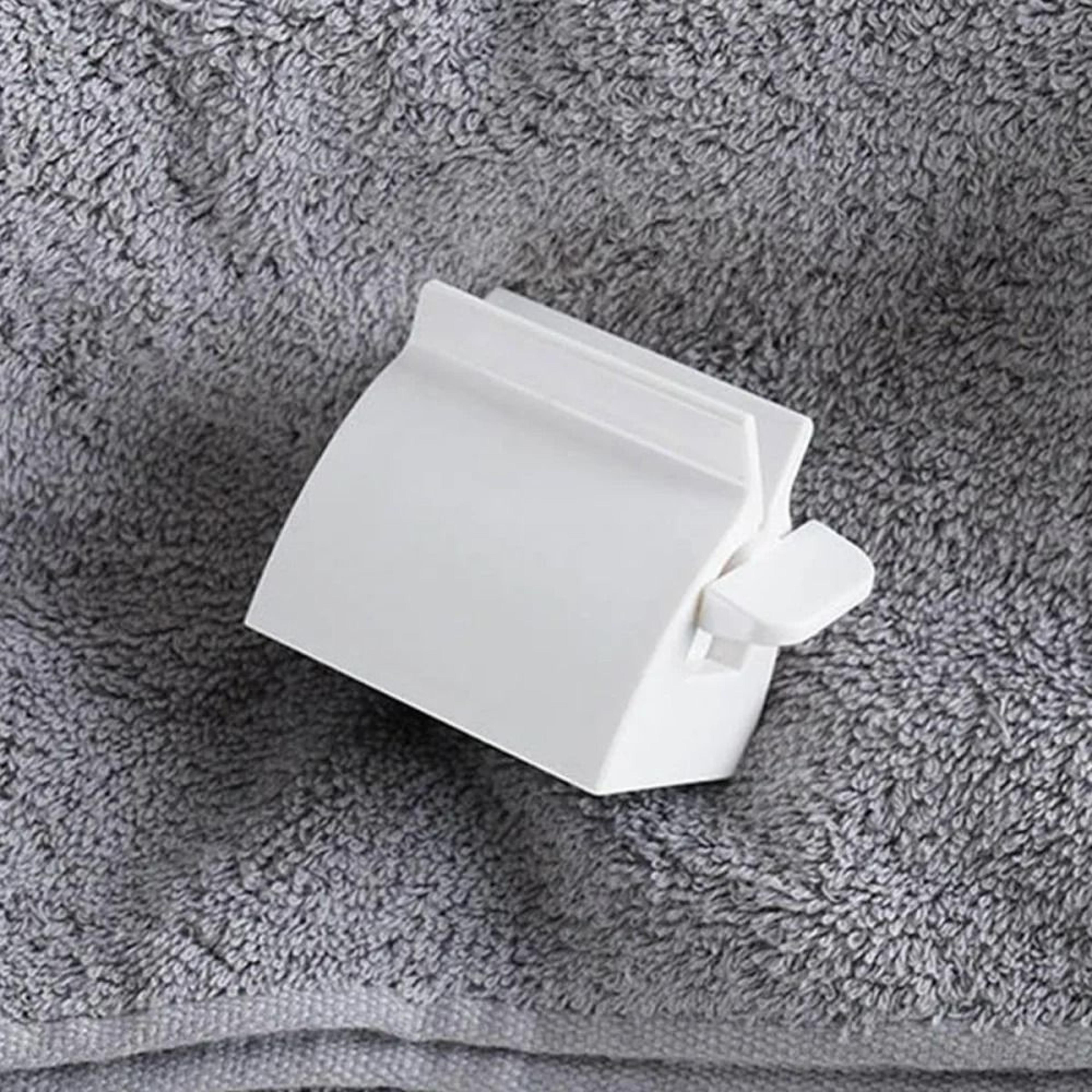 Manual Rolling Toothpaste Squeezer  Tube Dispenser Stand 3