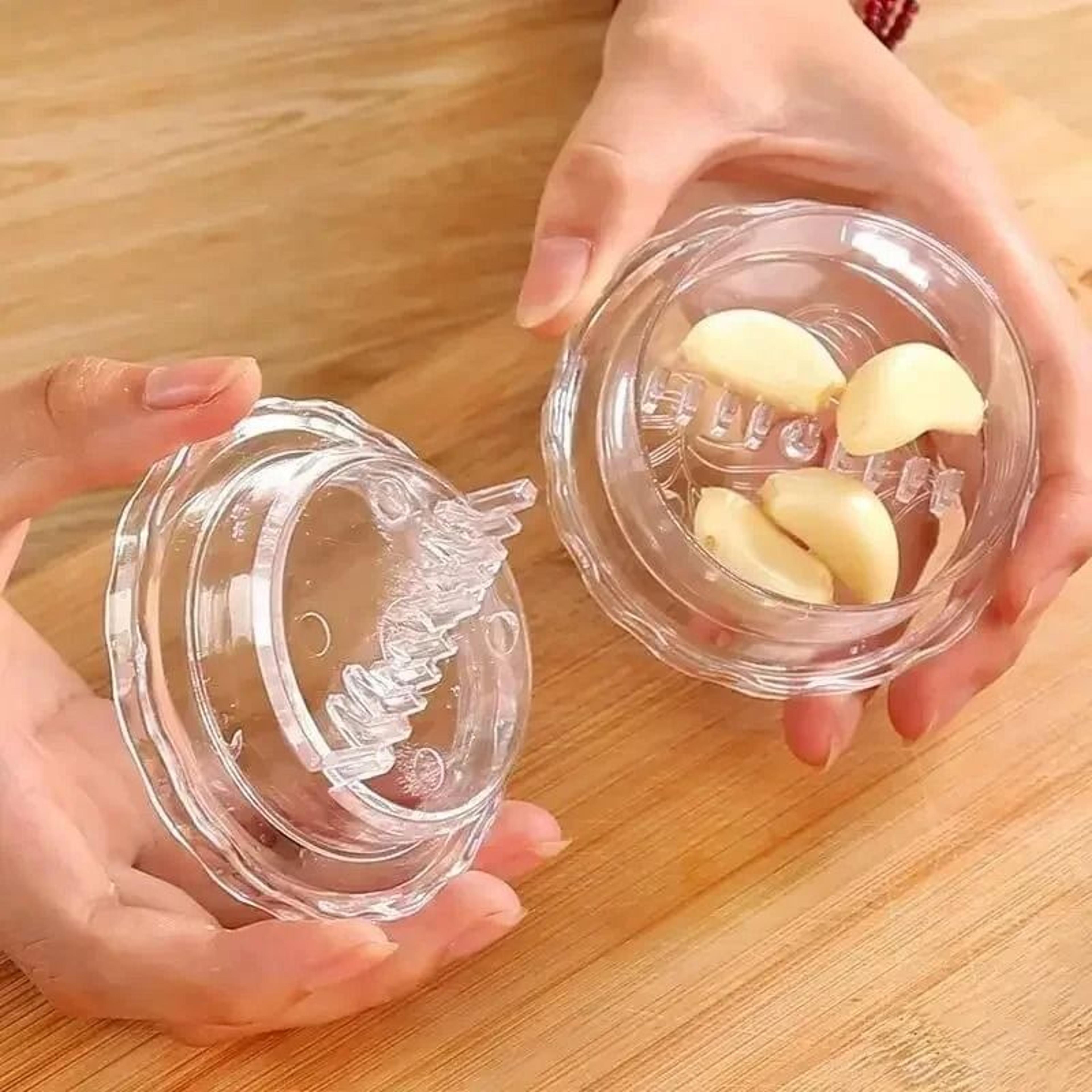 manual garlic crusher and rotational mincer tool
