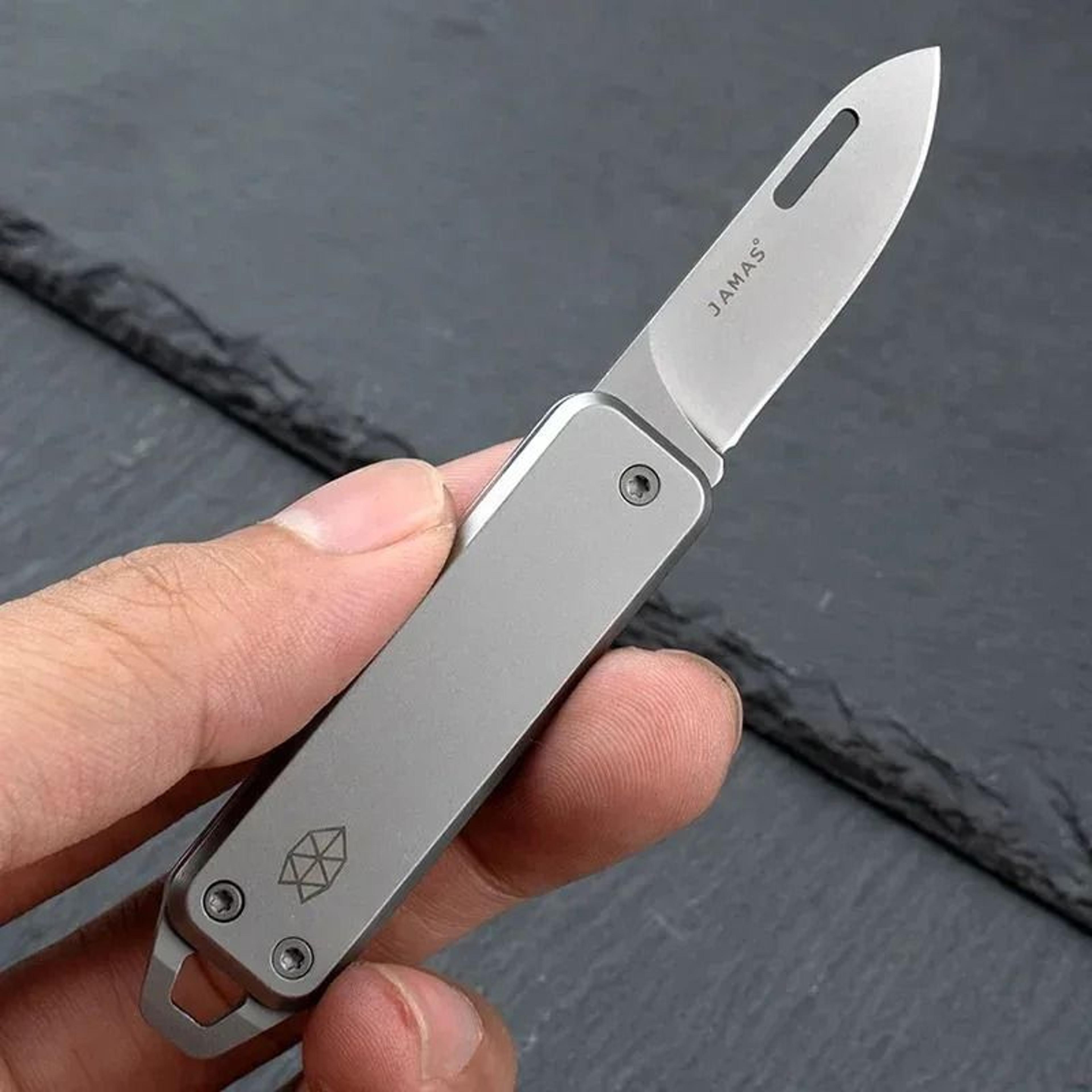 d2 high-carbon technical steel mini-utility and tactical pocket interface