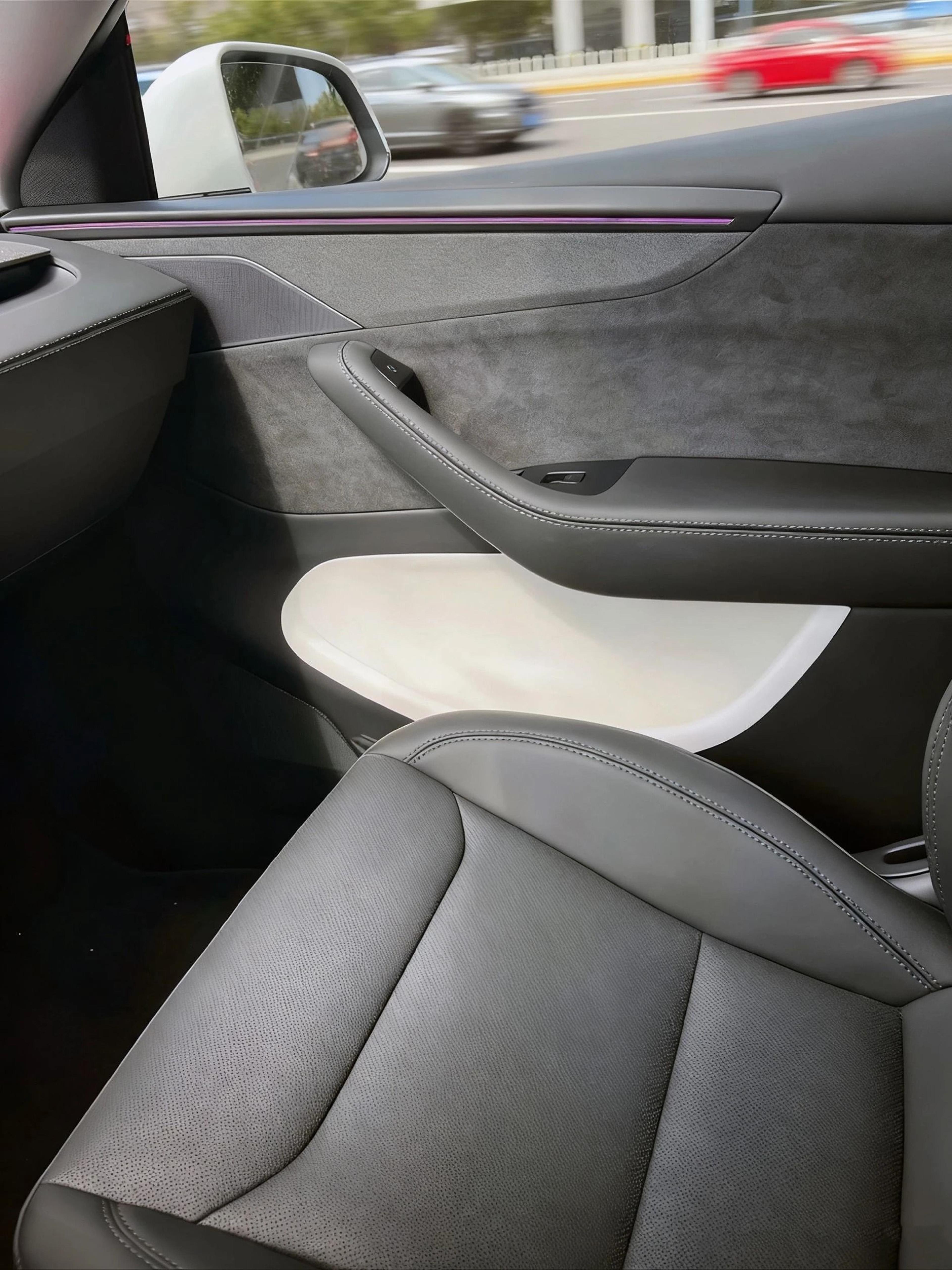 Tesla Model Y3 White Interior Door Pocket Stabilization Interface 2