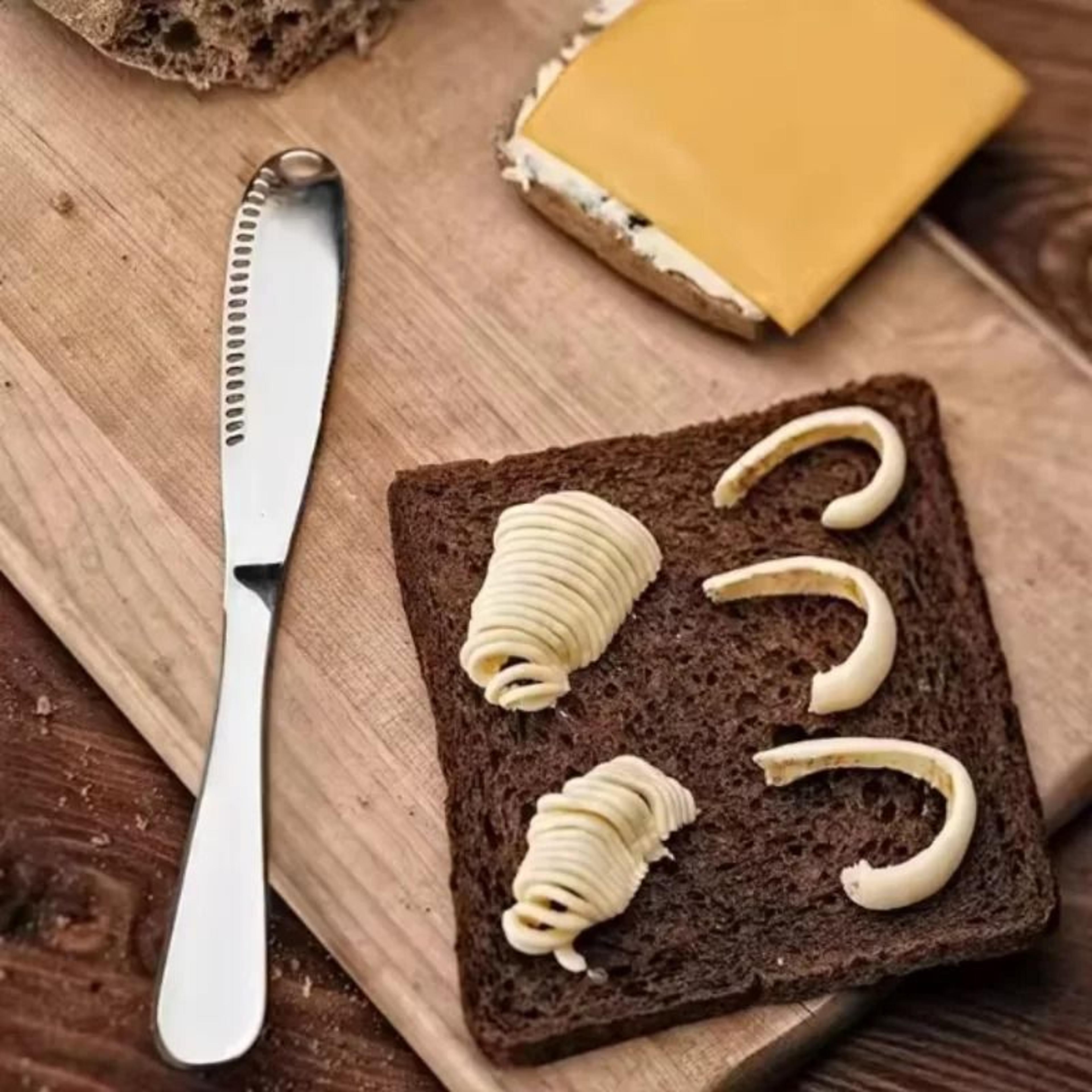 Stainless Steel Butter And Cheese Spread Knife With Non Stick Hole Design 4