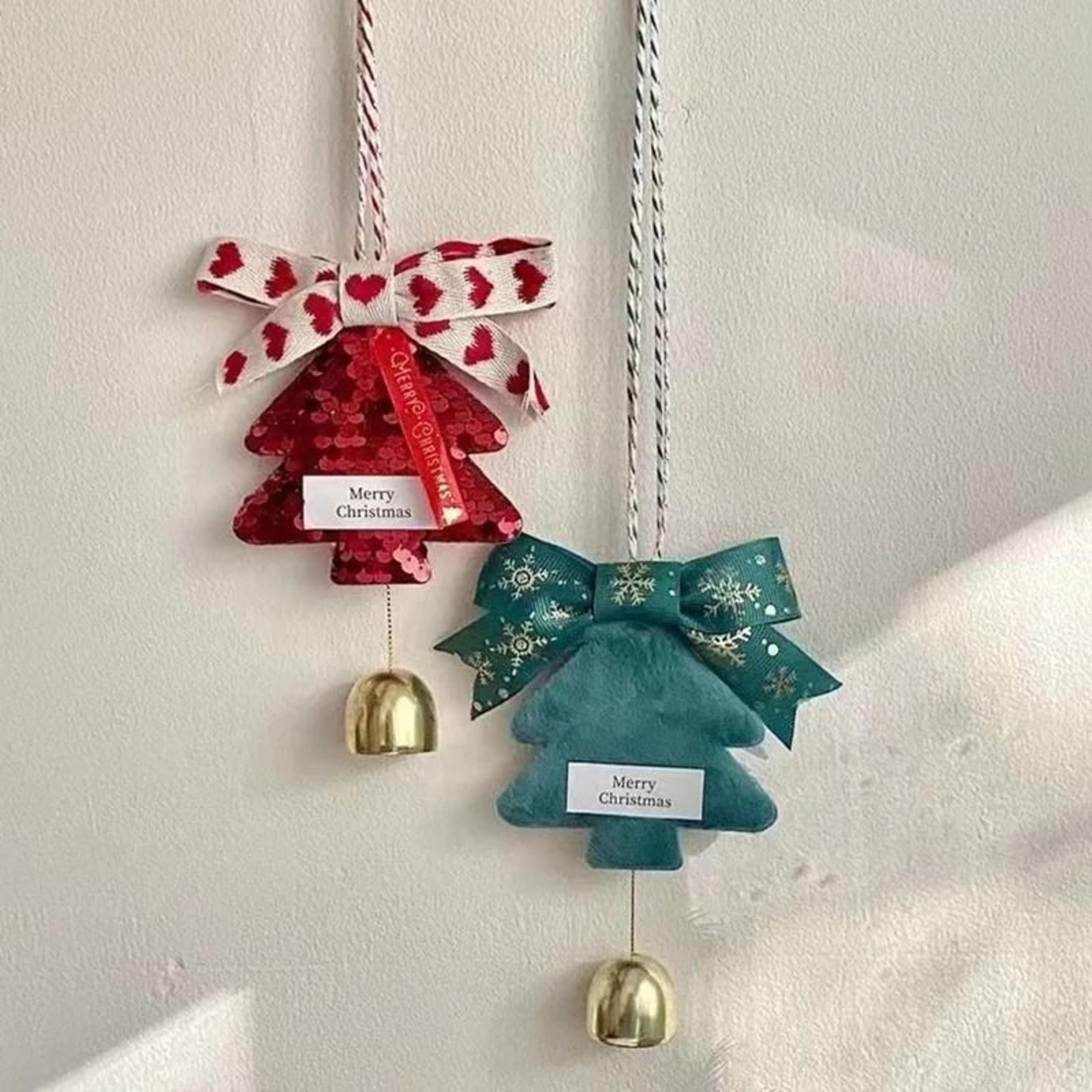 Christmas Tree Hanging Ornaments With Bows And Golden Caps 1