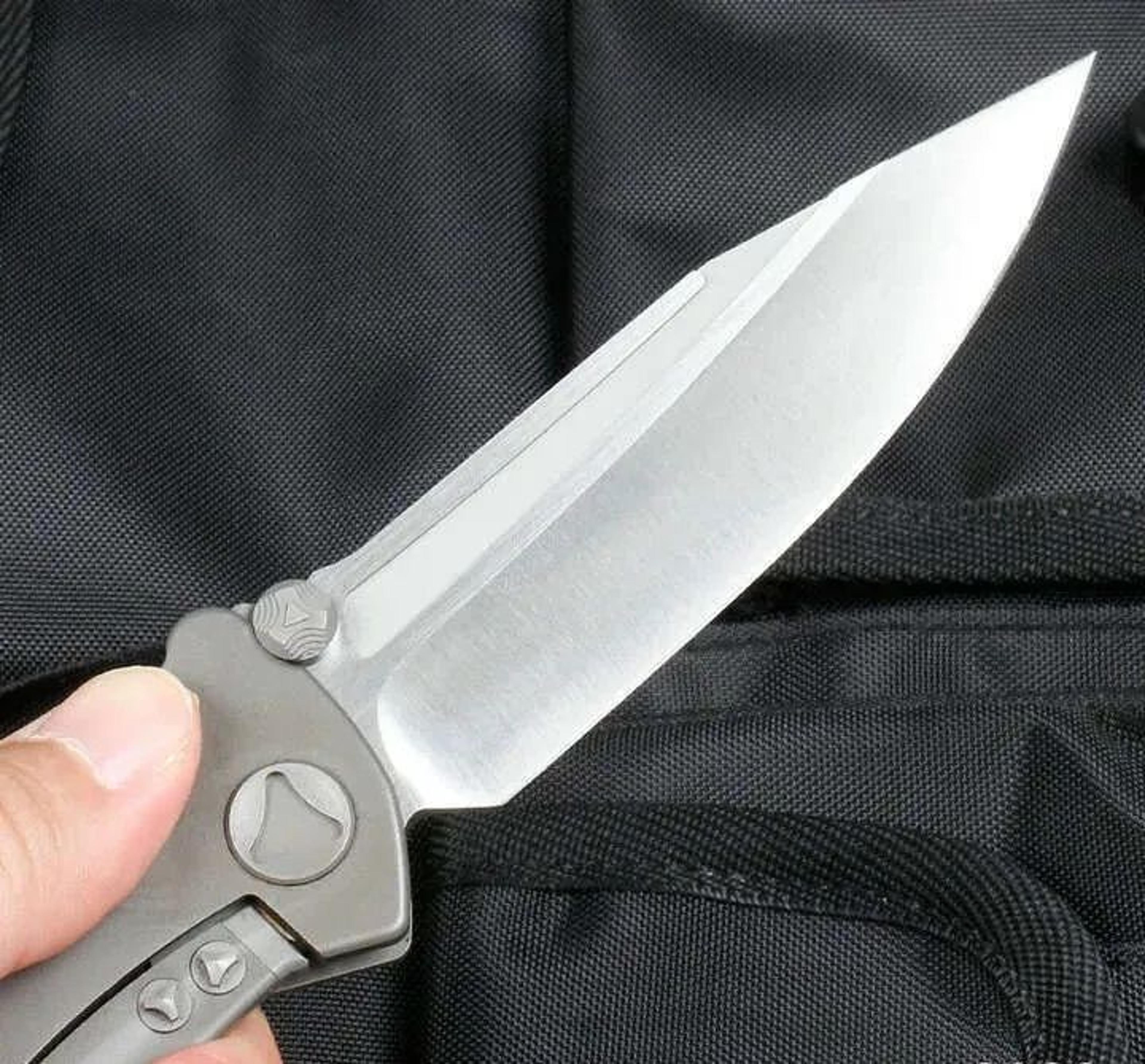 Drop Point Folding Pocket Knife With Titanium Handle And Ball Bearing Design 2