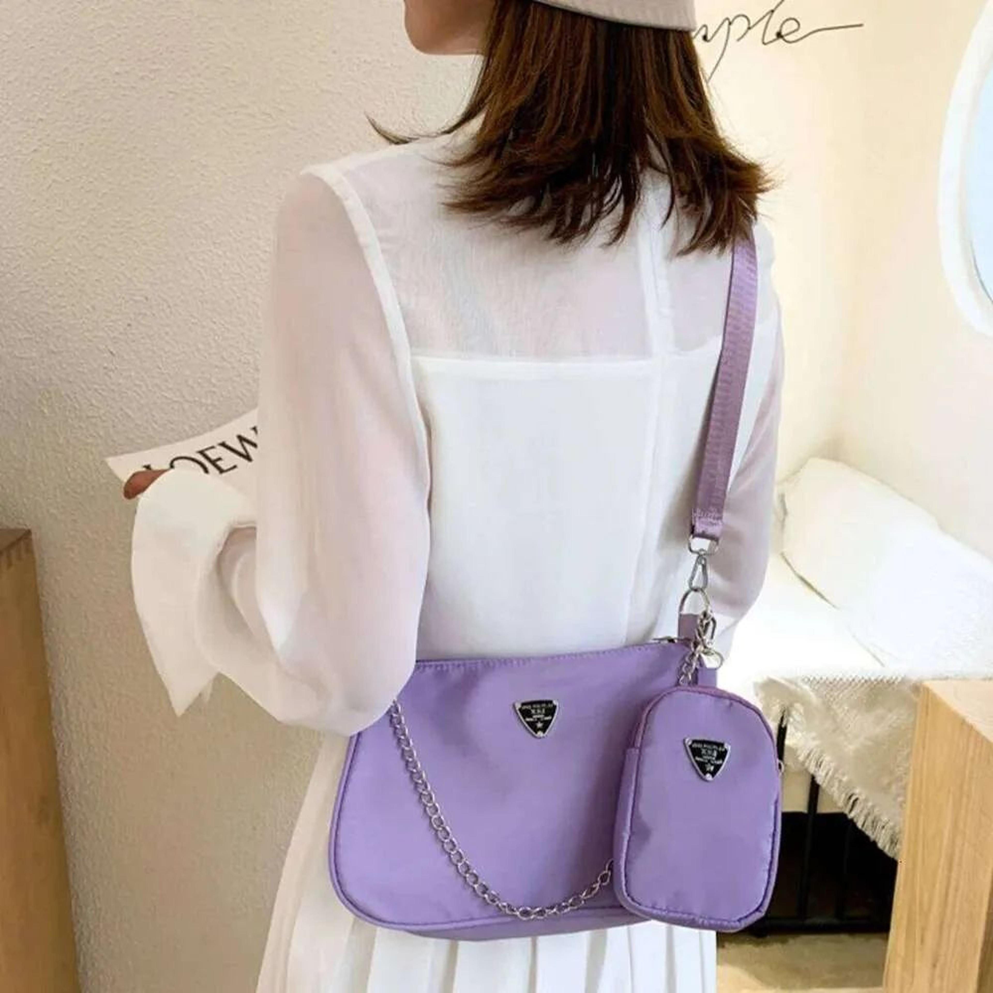 women's nylon crossbody bag with adjustable strap and zipper closure