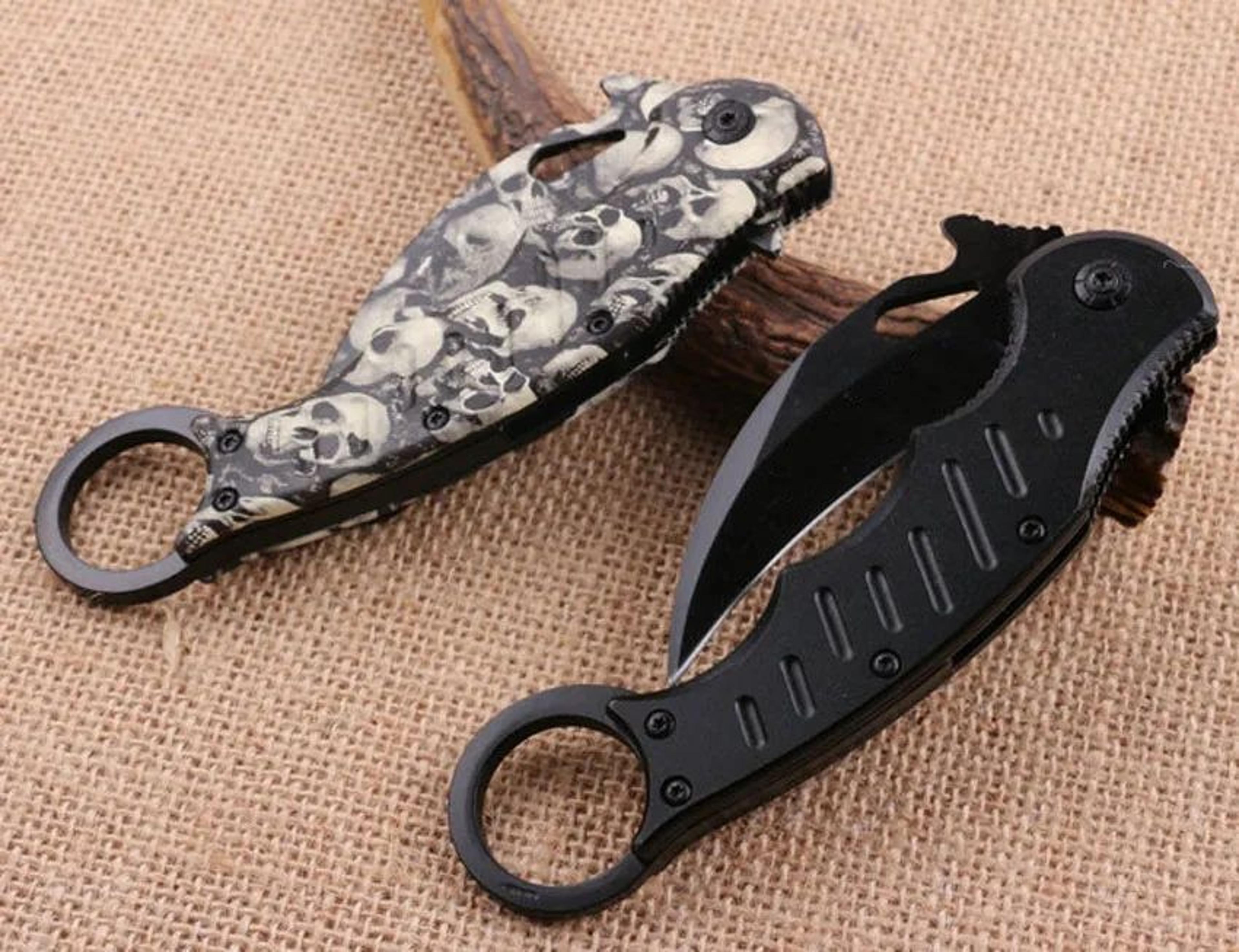 karambit folding knife with steel blade and aluminum handle
