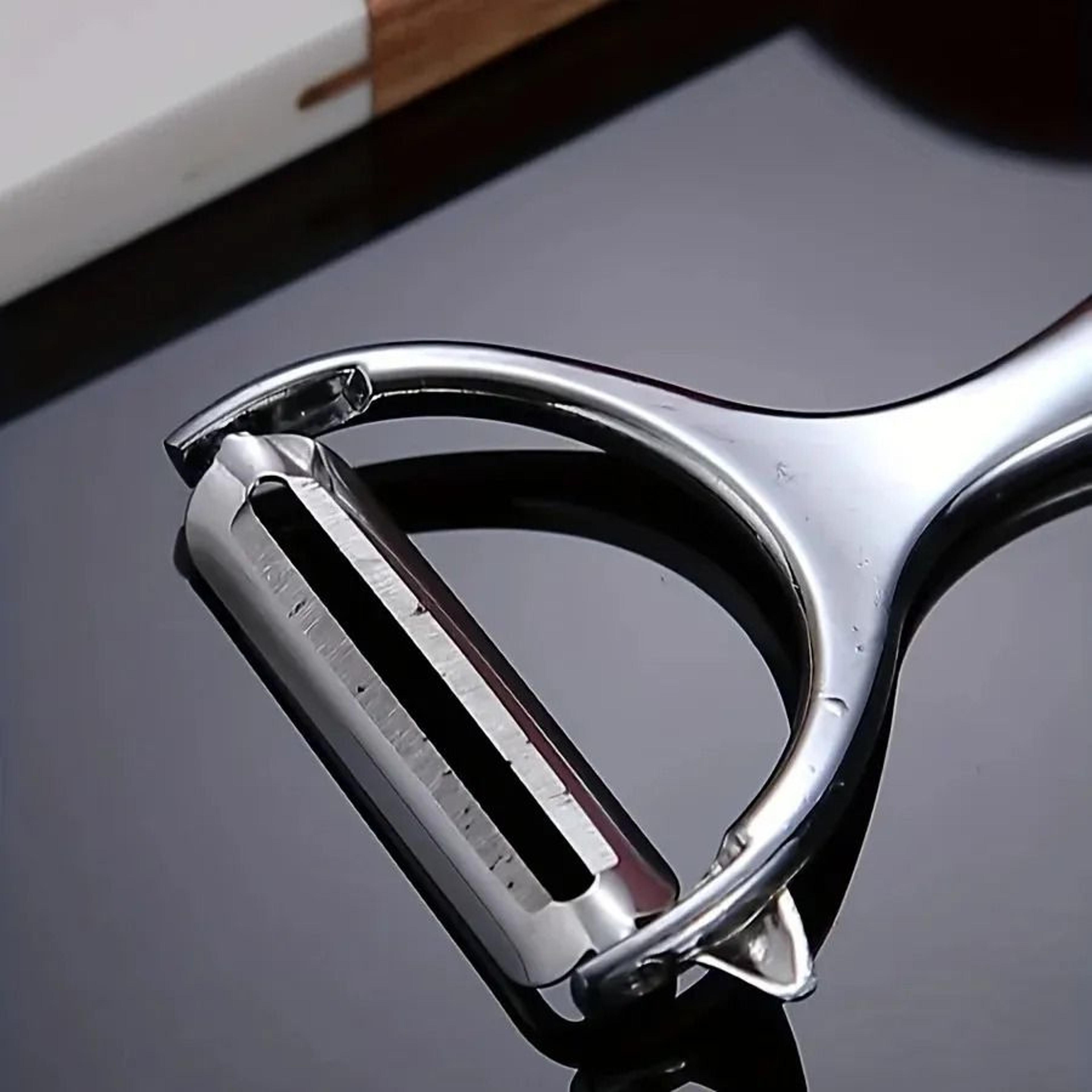 Stainless Steel Vegetable Peeler With Black Handle For Peeling Slicing And Grating 2