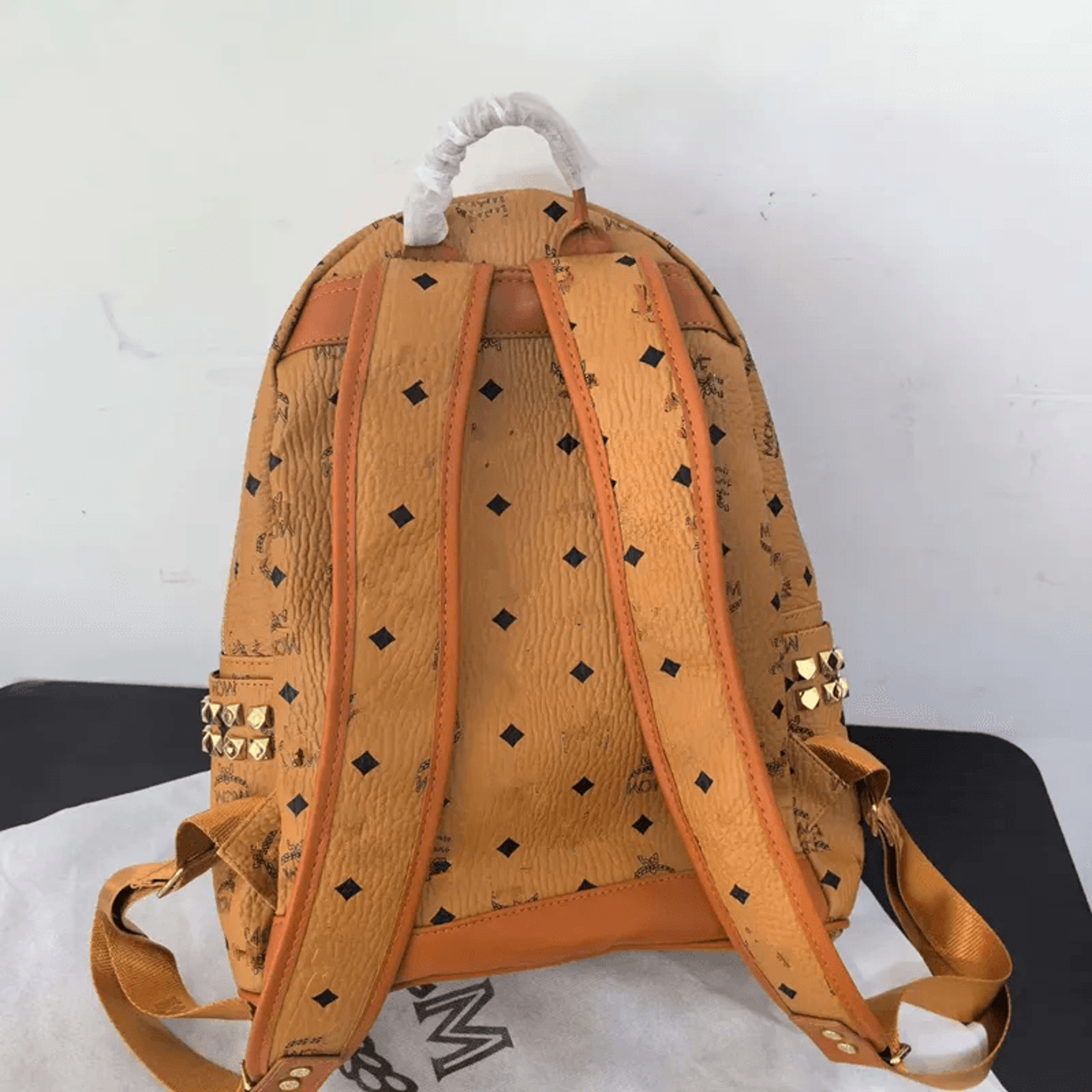 Studded Cognac Brown Backpack With Monogram And Pyramid Rivet Detail 4