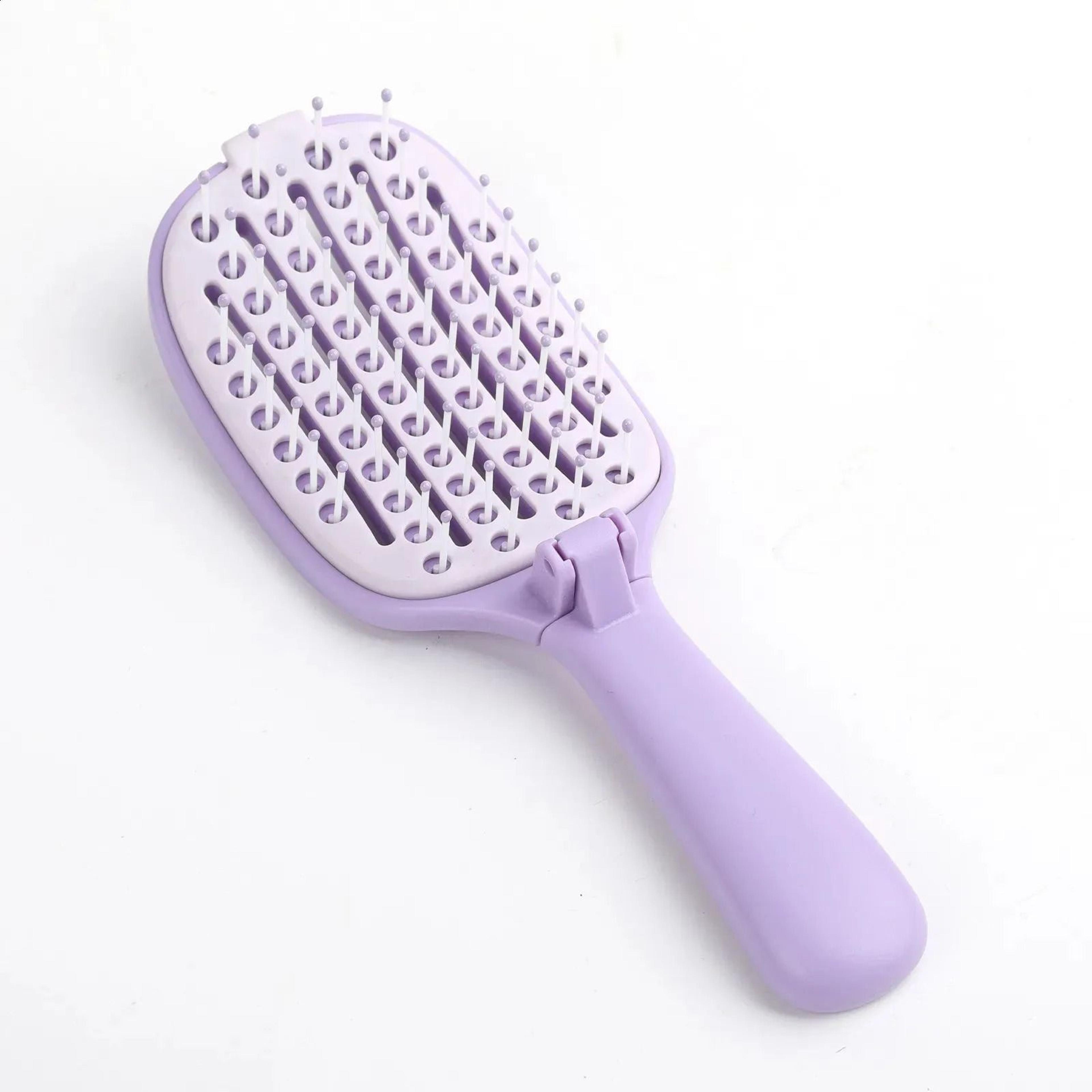 Self Cleaning Hair Brush With Foldable Massage Comb Design 1