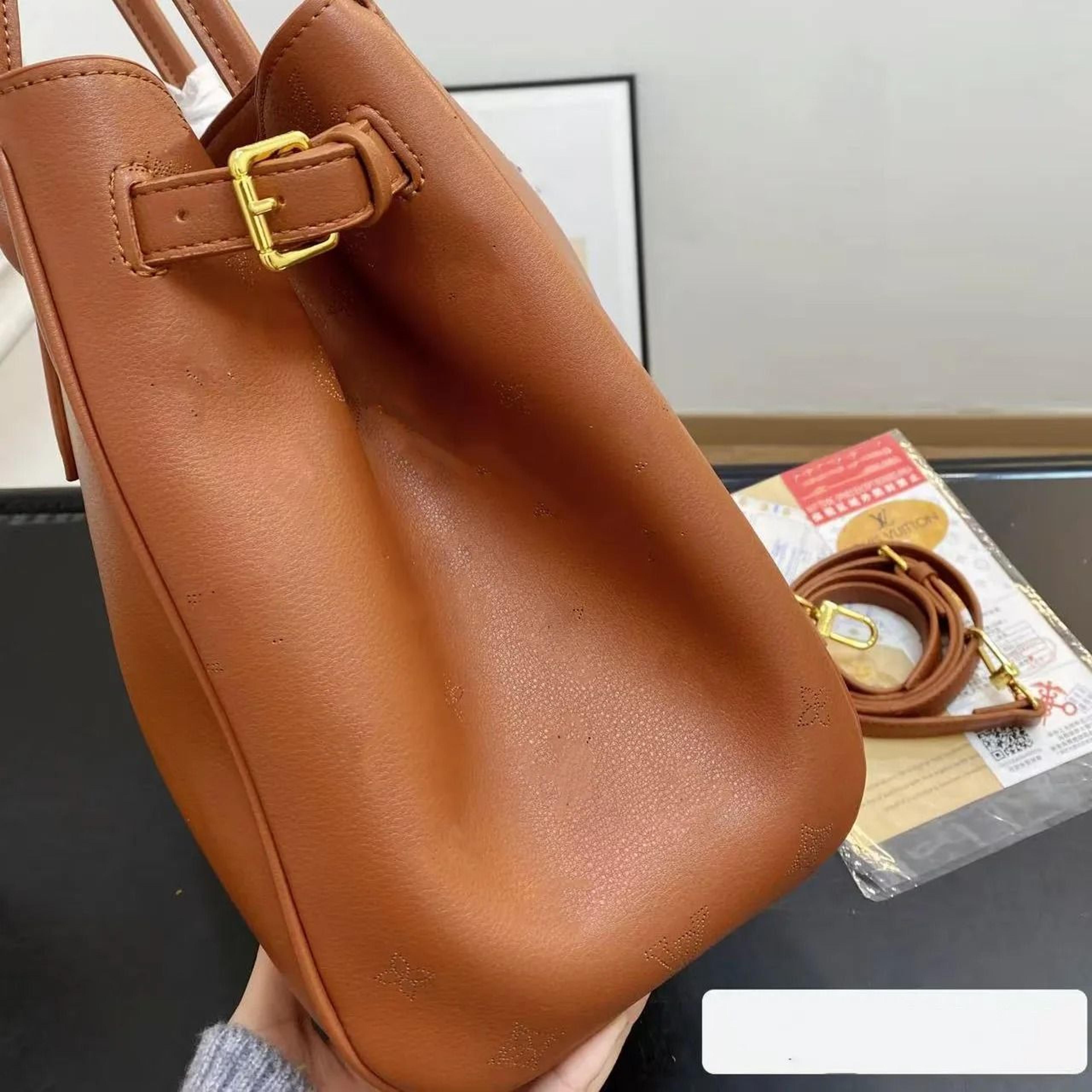 Large Leather Tote Bag With Metal Lock Closure And Shoulder Crossbody Design 2