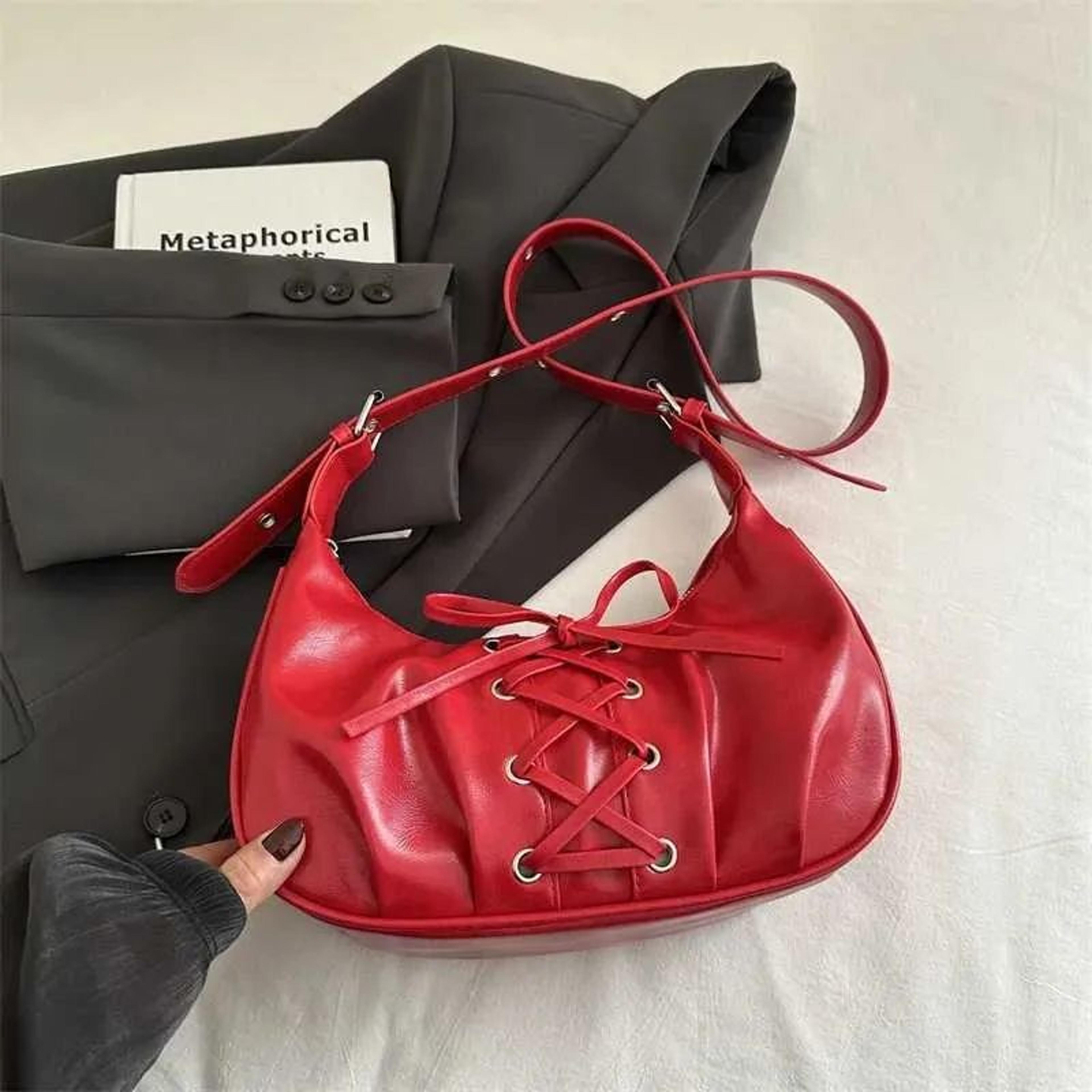 women pu leather dumpling bag with lace-up bow shoulder and crossbody style