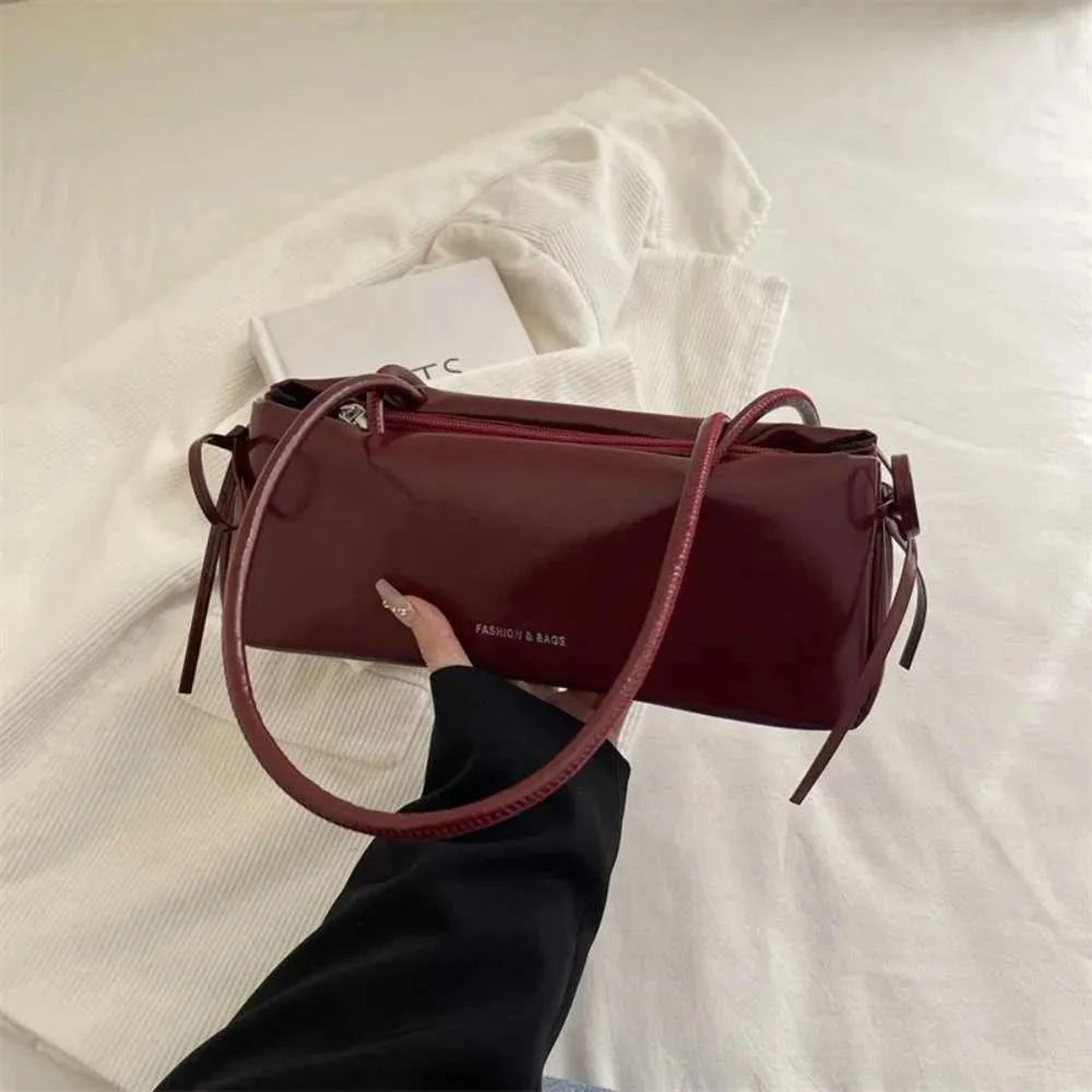 womens solid color polyester shoulder bag with knot detail