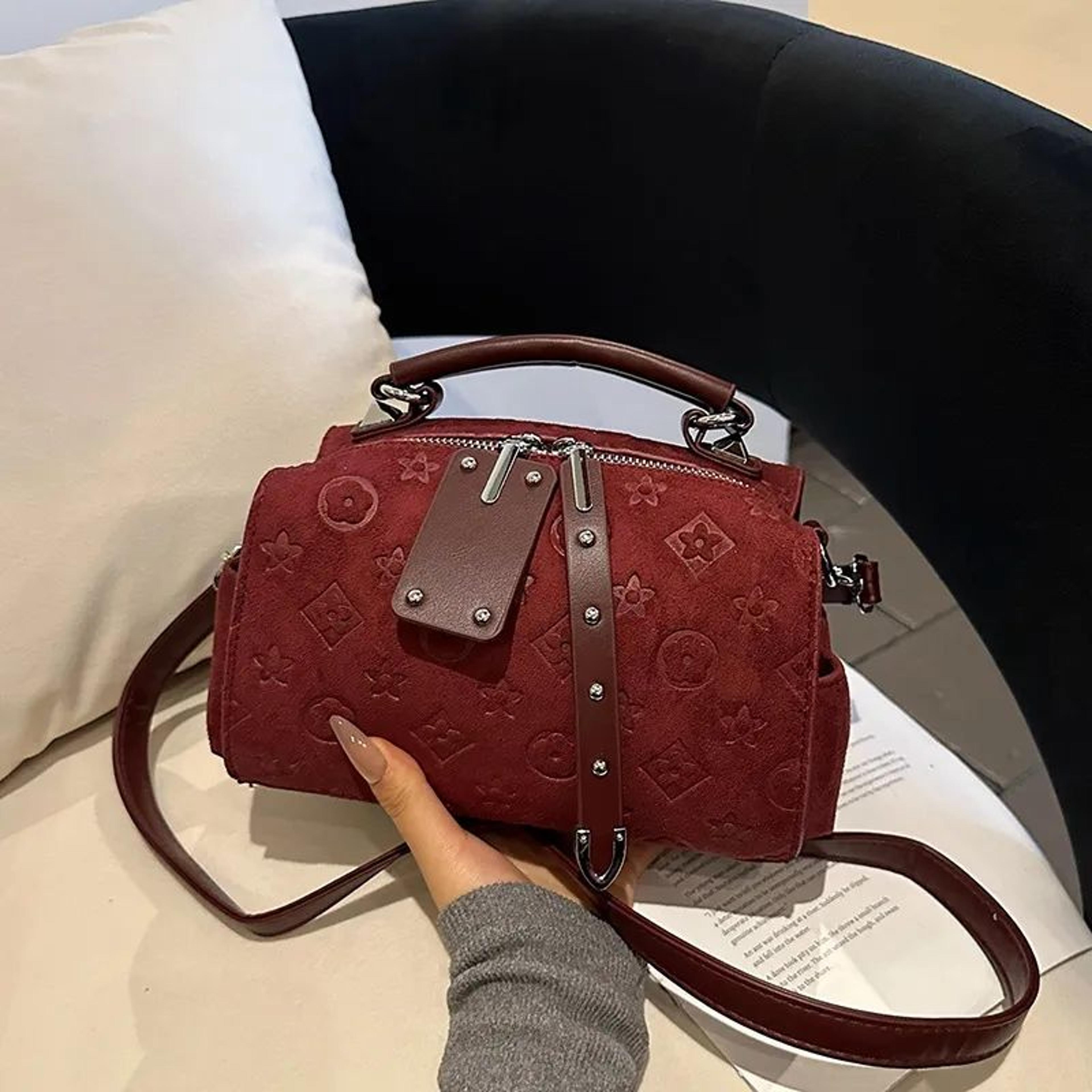 women crossbody pillow bag with frosted finish and boston handbag style