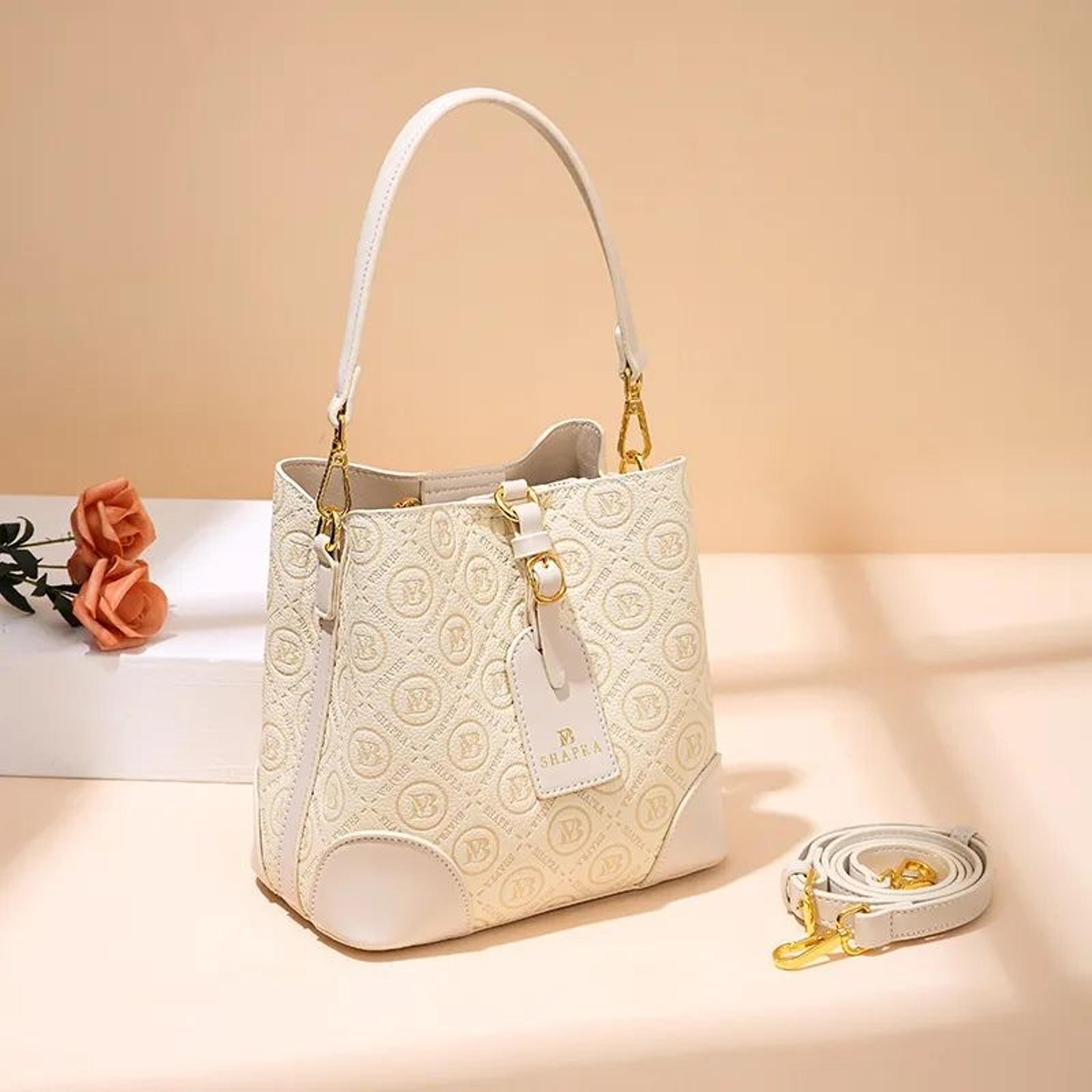 large capacity embossed faux leather bucket bag with retro print