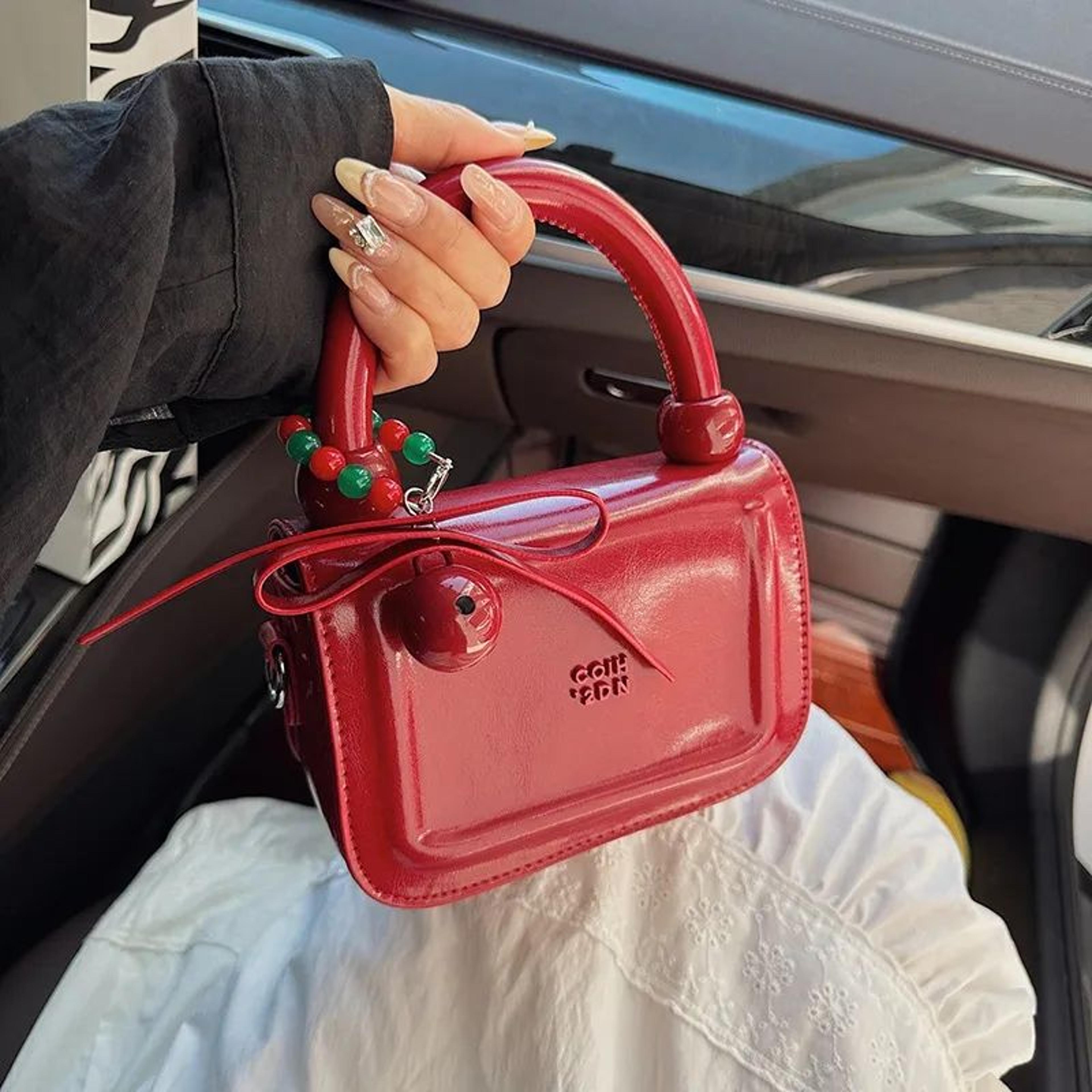 women's small square crossbody bag with adjustable strap and minimalist design
