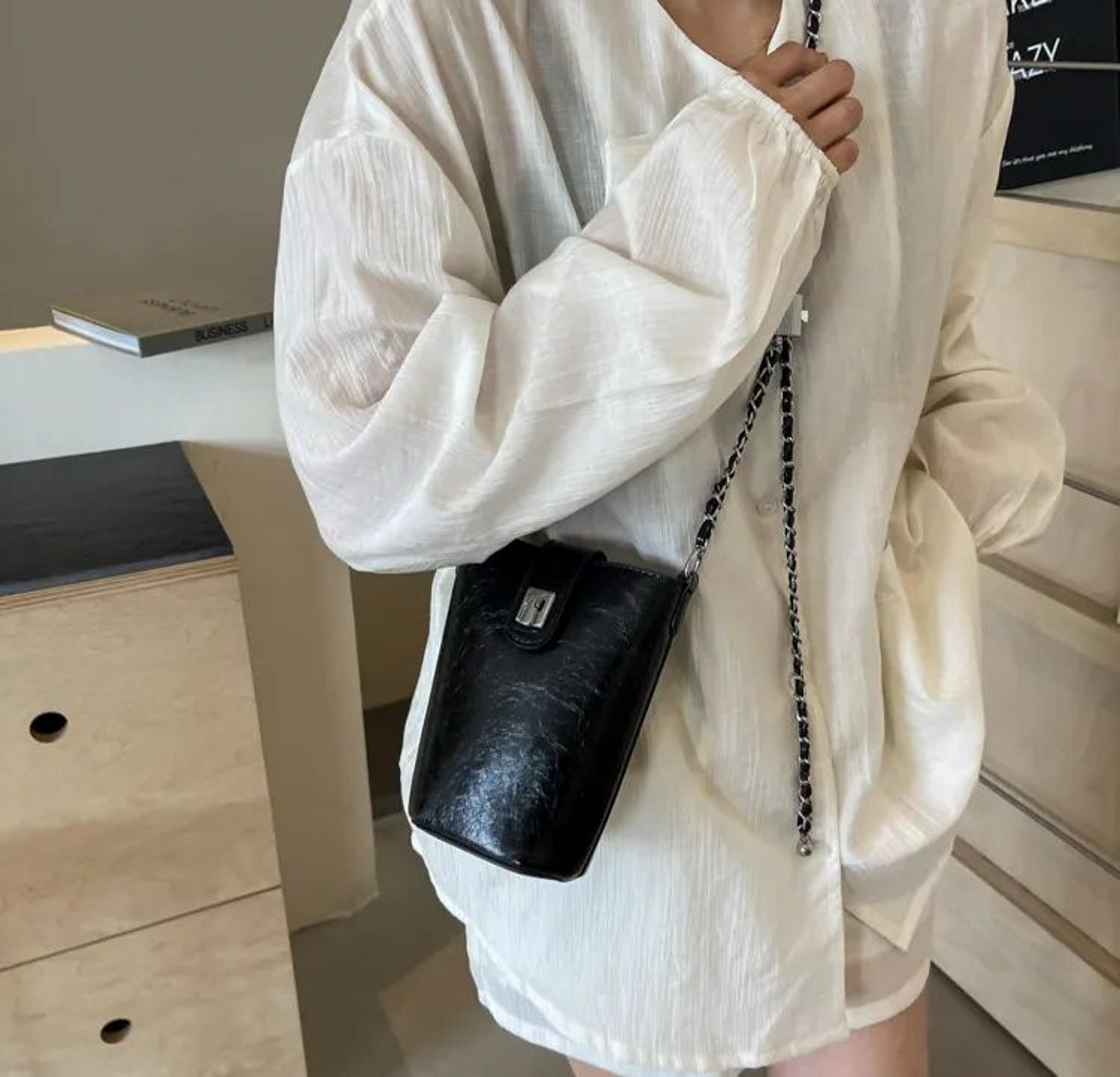 women minimalist bucket bag with chain crossbody strap