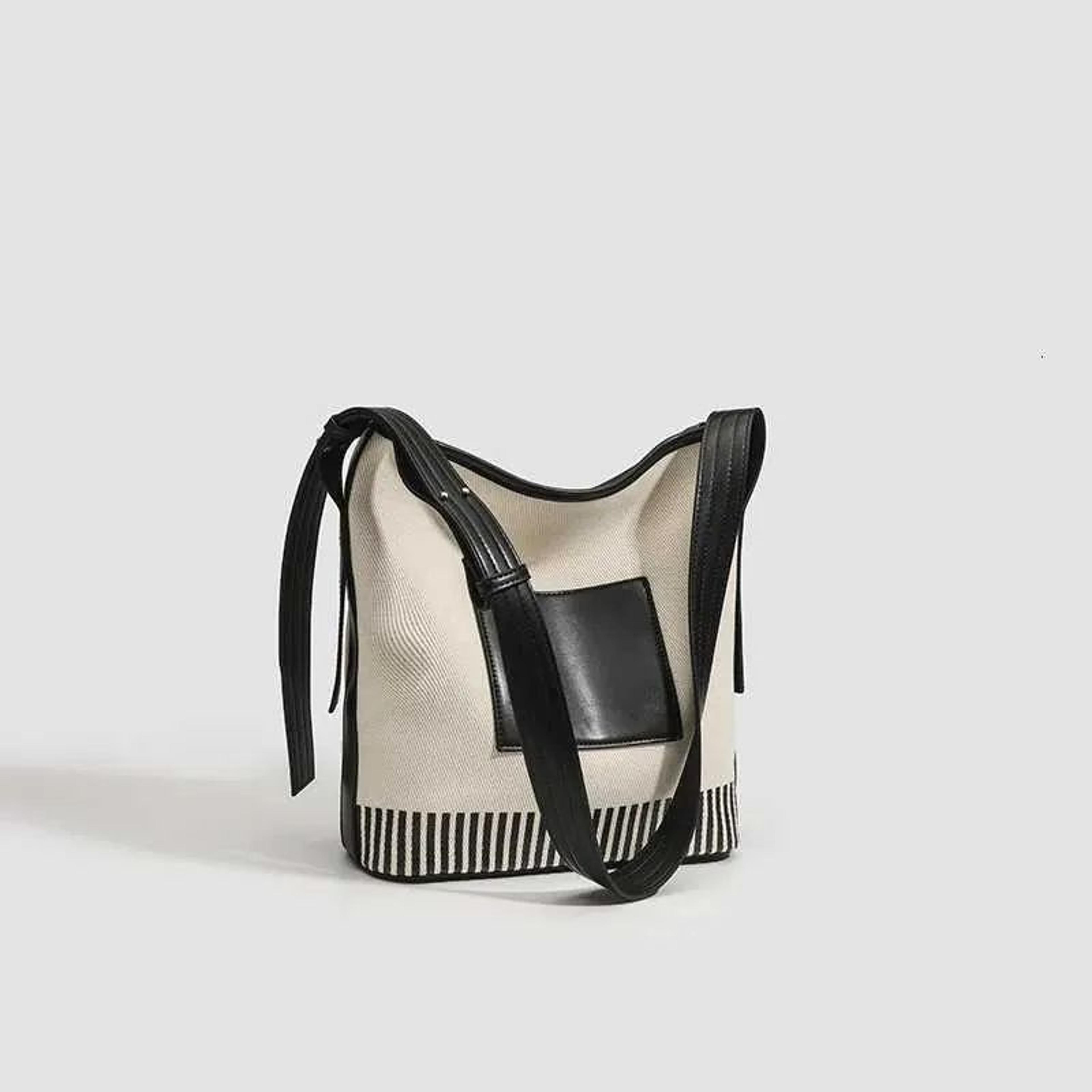 Womens Large Capacity Canvas Shoulder Bag With Vegan Leather Bucket Design 1