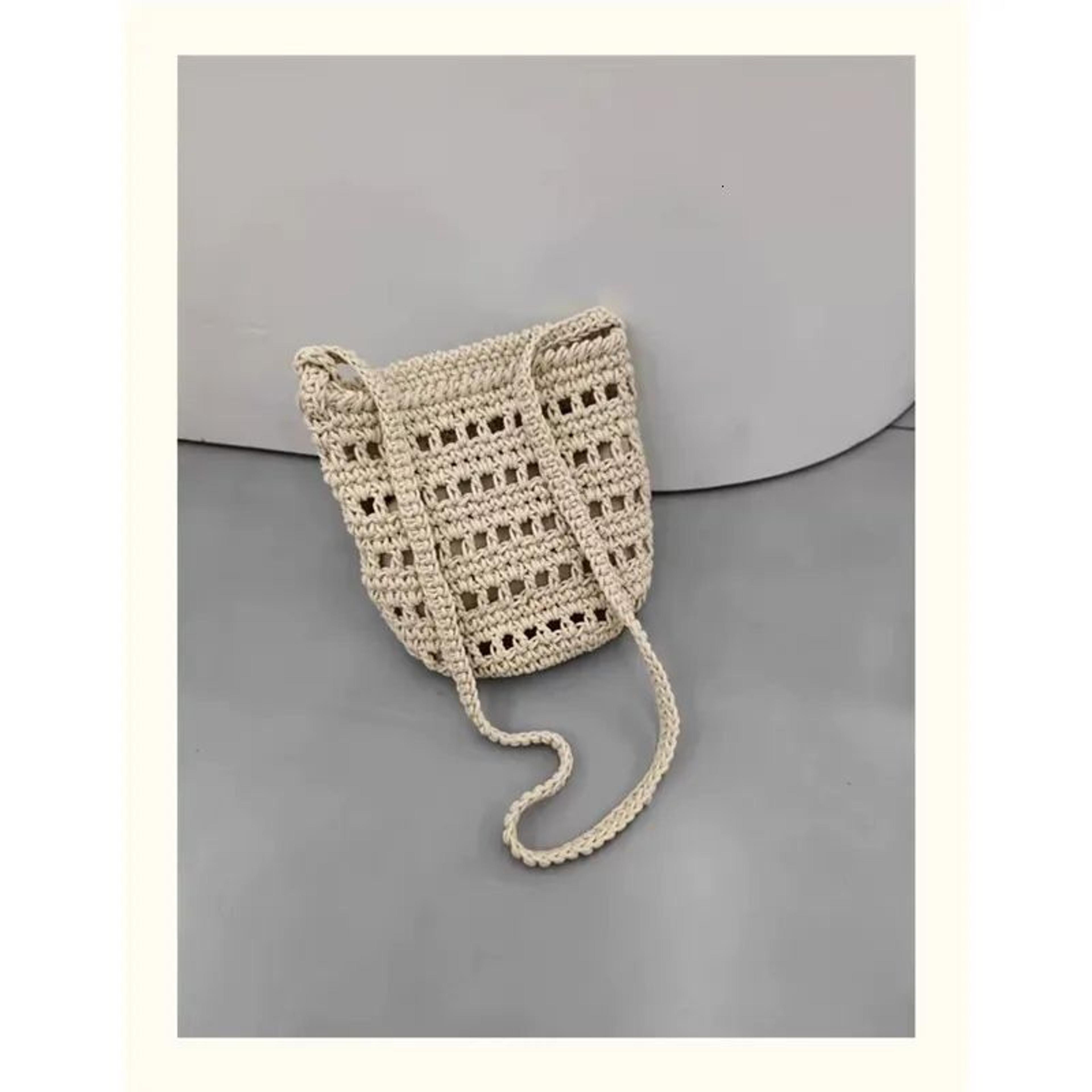 women handwoven wax rope bucket bag with hollow-out design