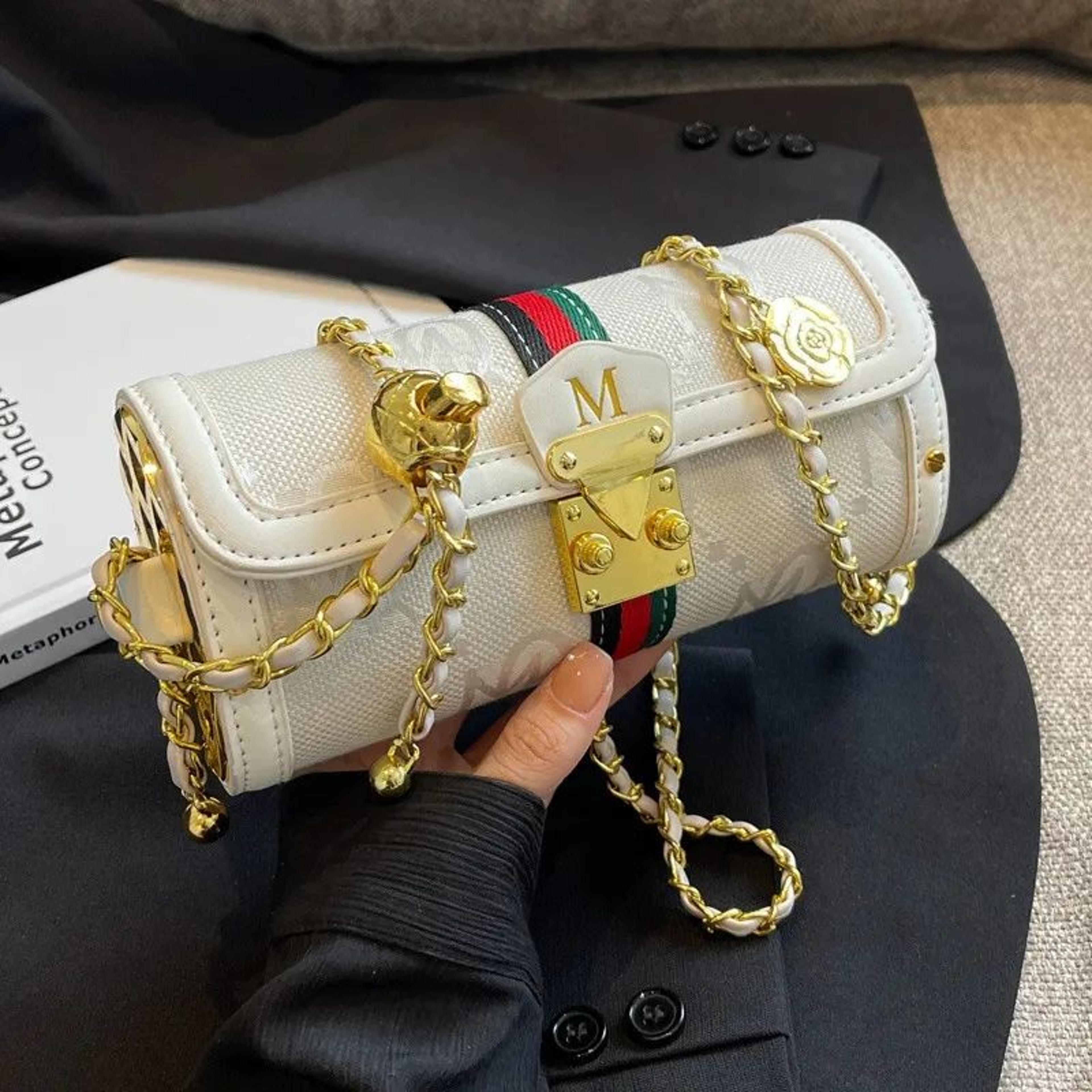 monogram cylinder shoulder bag for women with adjustable gold chain strap